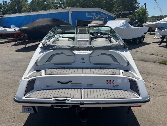 2017 Yamaha Boats SX190, rear view, parked outdoors at a marina.