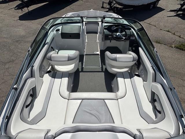 2017 Yamaha Boats SX190 interior with white seating and steering wheel, viewed from above.