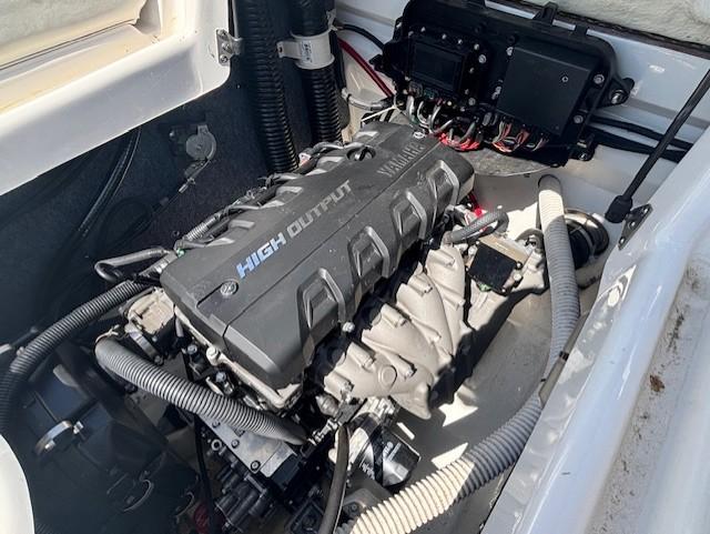 2017 Yamaha SX190 boat engine compartment with high output engine visible.