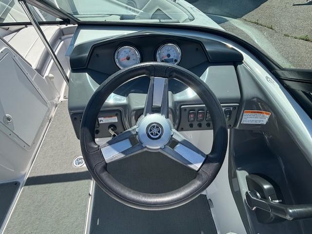 Steering wheel and dashboard of 2017 Yamaha Boats SX190.