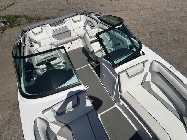 2017 Yamaha Boats SX190 interior with white and gray seating, open bow design.