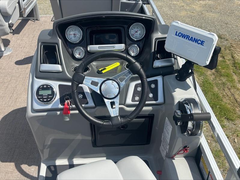 Steering console of 2022 Ranger 220 F boat with Lowrance navigation system.