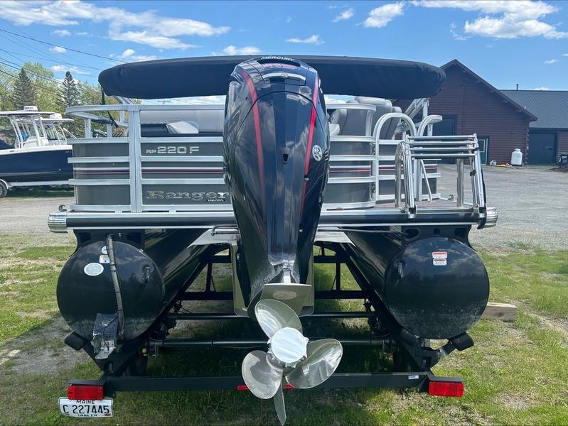 2022 Ranger 220 F pontoon boat with Mercury outboard motor, parked on trailer.
