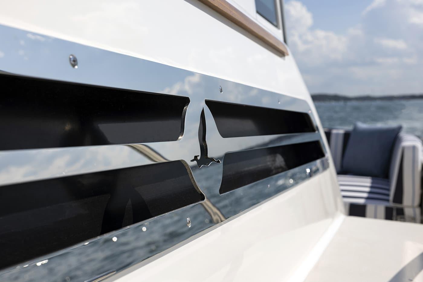 Close-up of 2026 Back Cove 412 yacht detail with ocean backdrop.