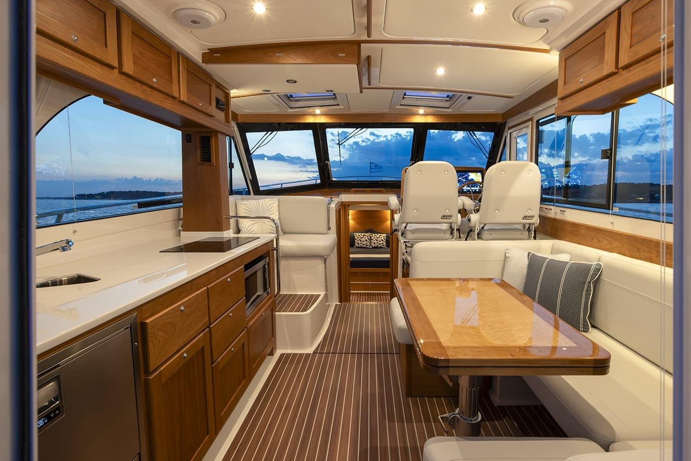 Luxurious interior of 2026 Back Cove 412 yacht with elegant wood finishes and modern amenities.