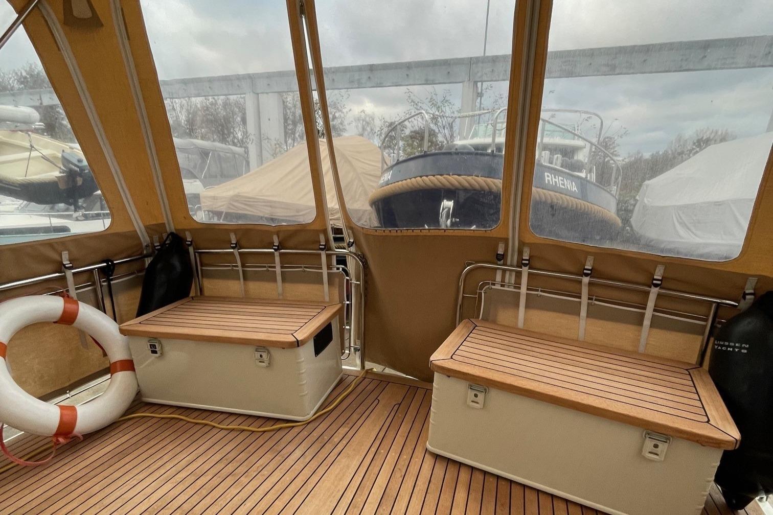 Linssen 36.9 boat interior, 2012 model, featuring wooden benches and a life preserver.