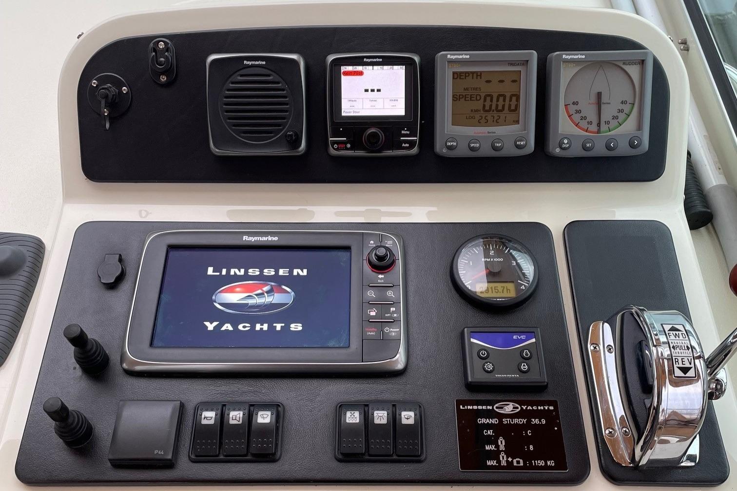 Control panel of a 2012 Linssen 36.9 yacht with navigation and monitoring instruments.
