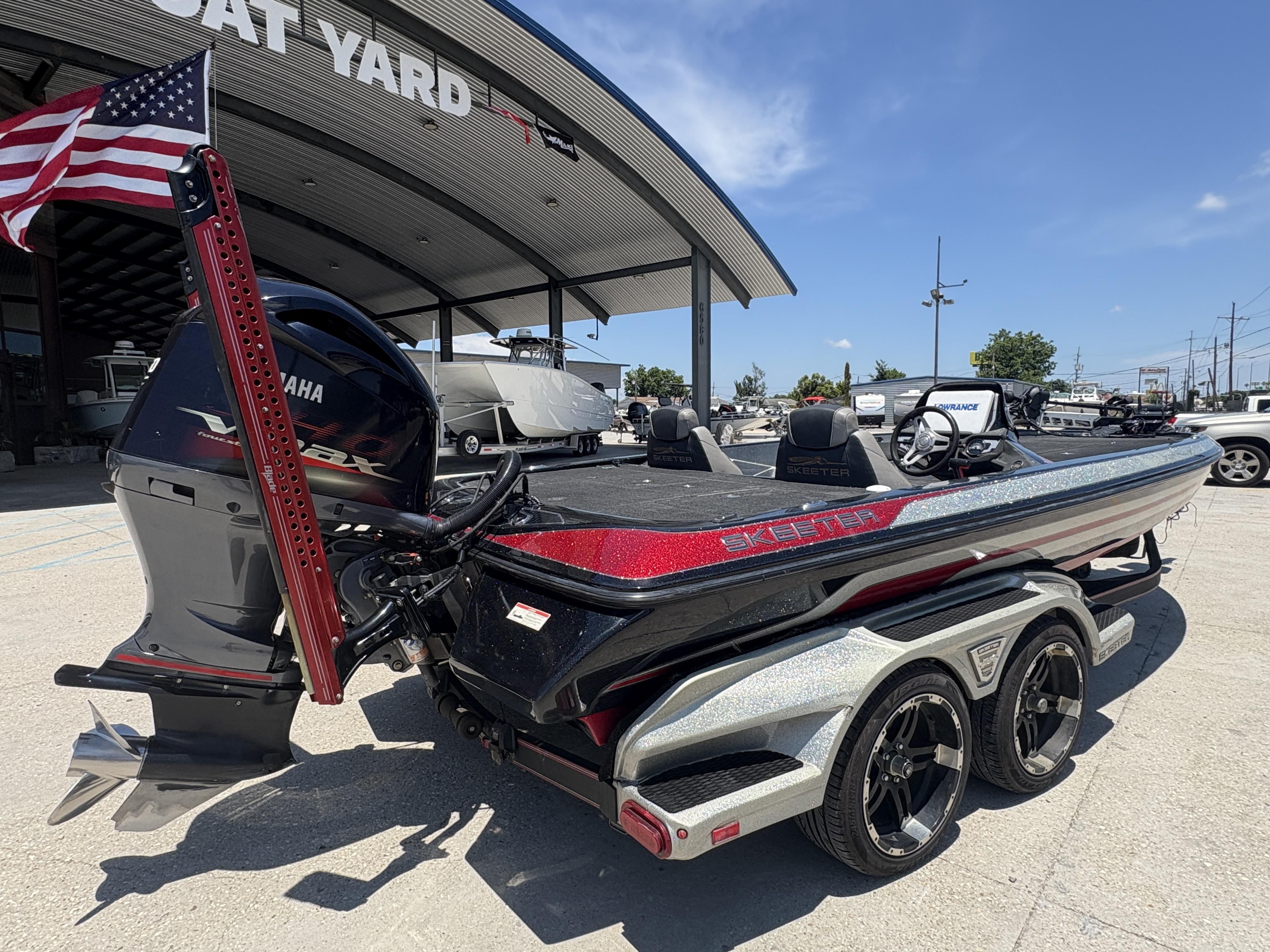2018 Skeeter FX 21 boat with Yamaha engine at a boat yard, featuring sleek design.