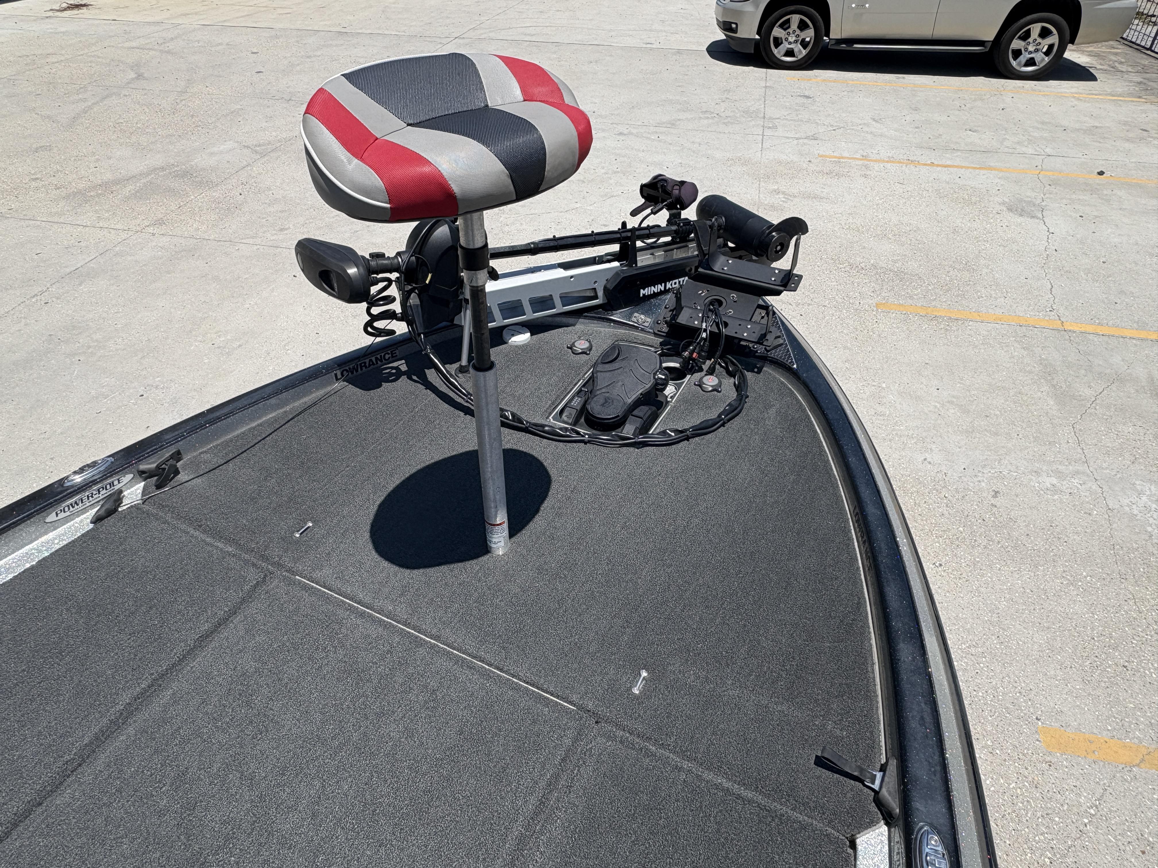 2018 Skeeter FX 21 boat deck with seat and trolling motor.