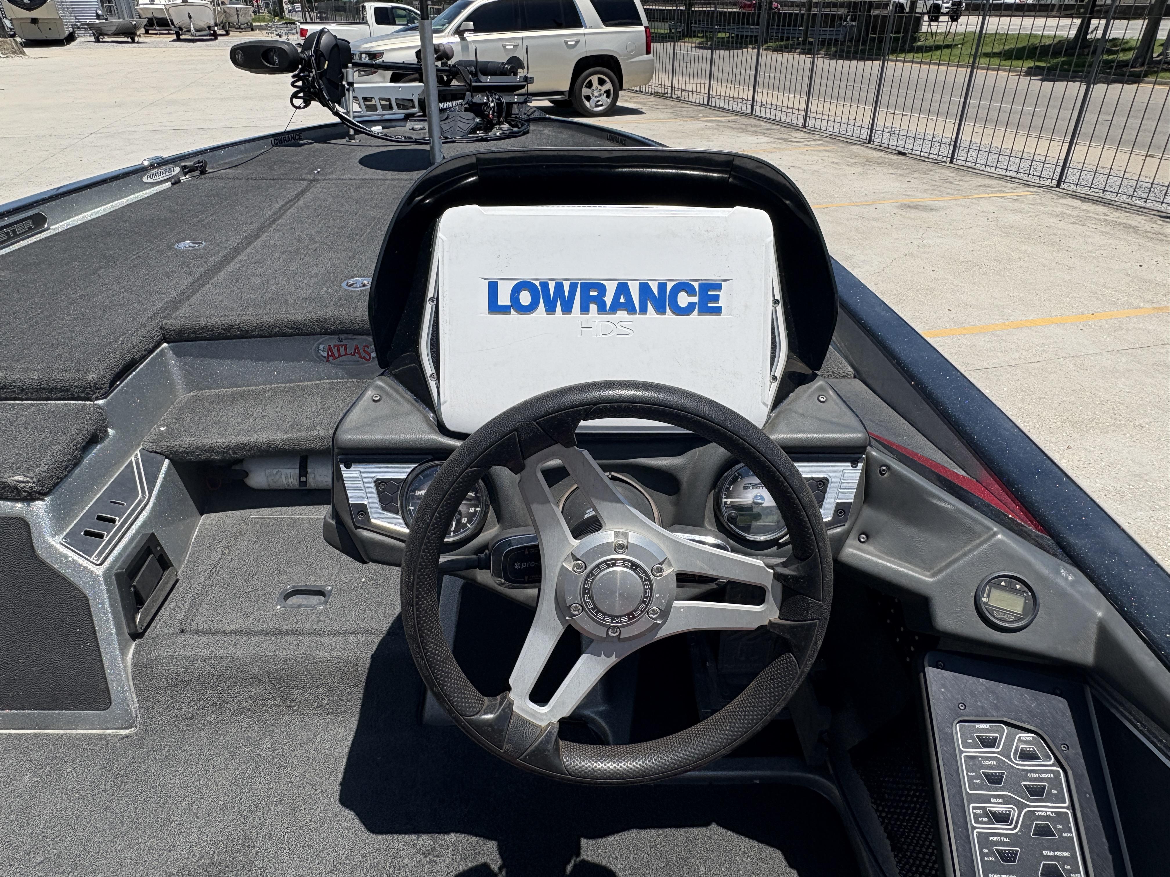 2018 Skeeter FX 21 boat dashboard with Lowrance HDS system and steering wheel.