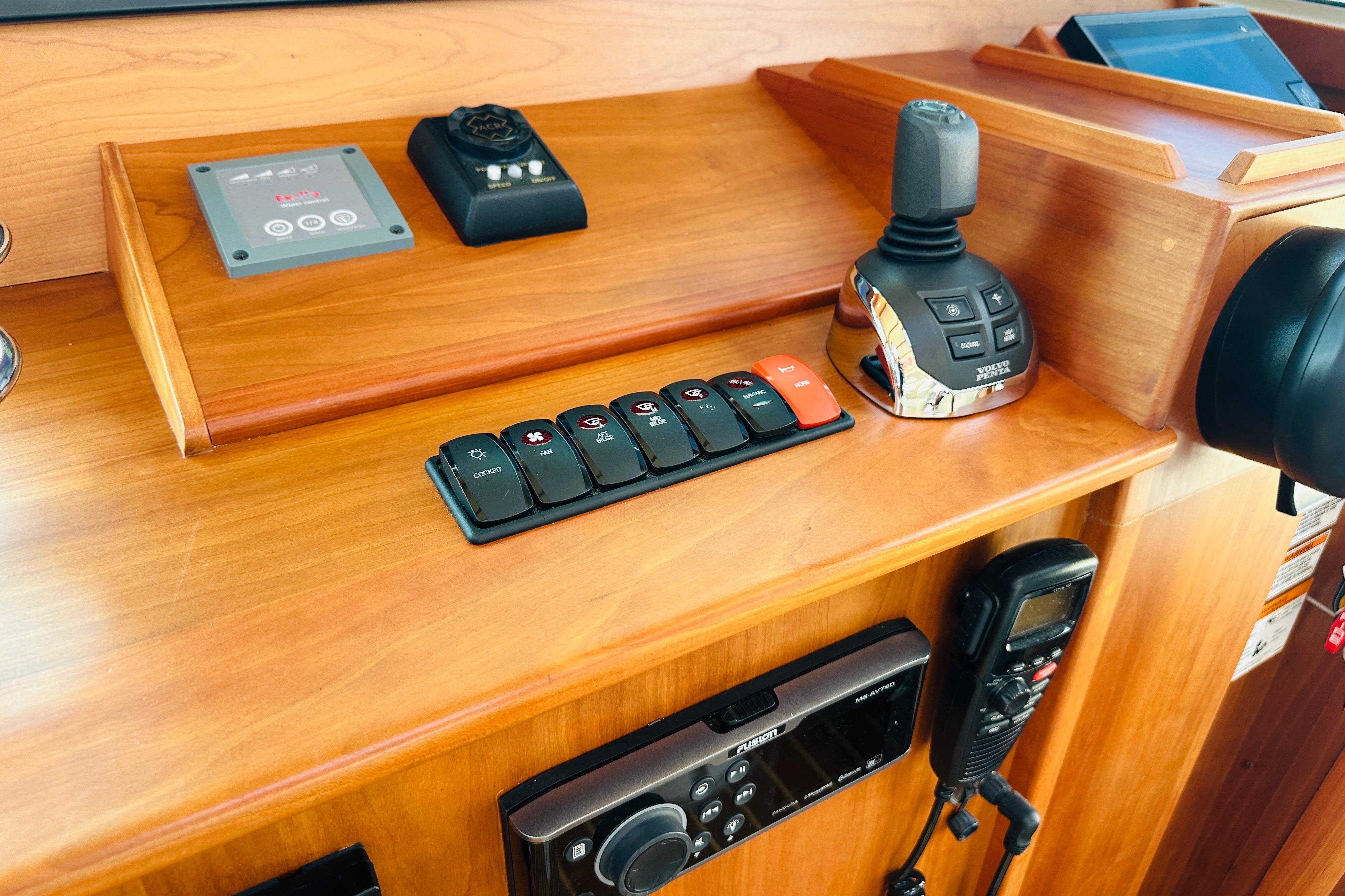 Control panel of 2017 Sabre 42 Salon Express with joystick and switches.