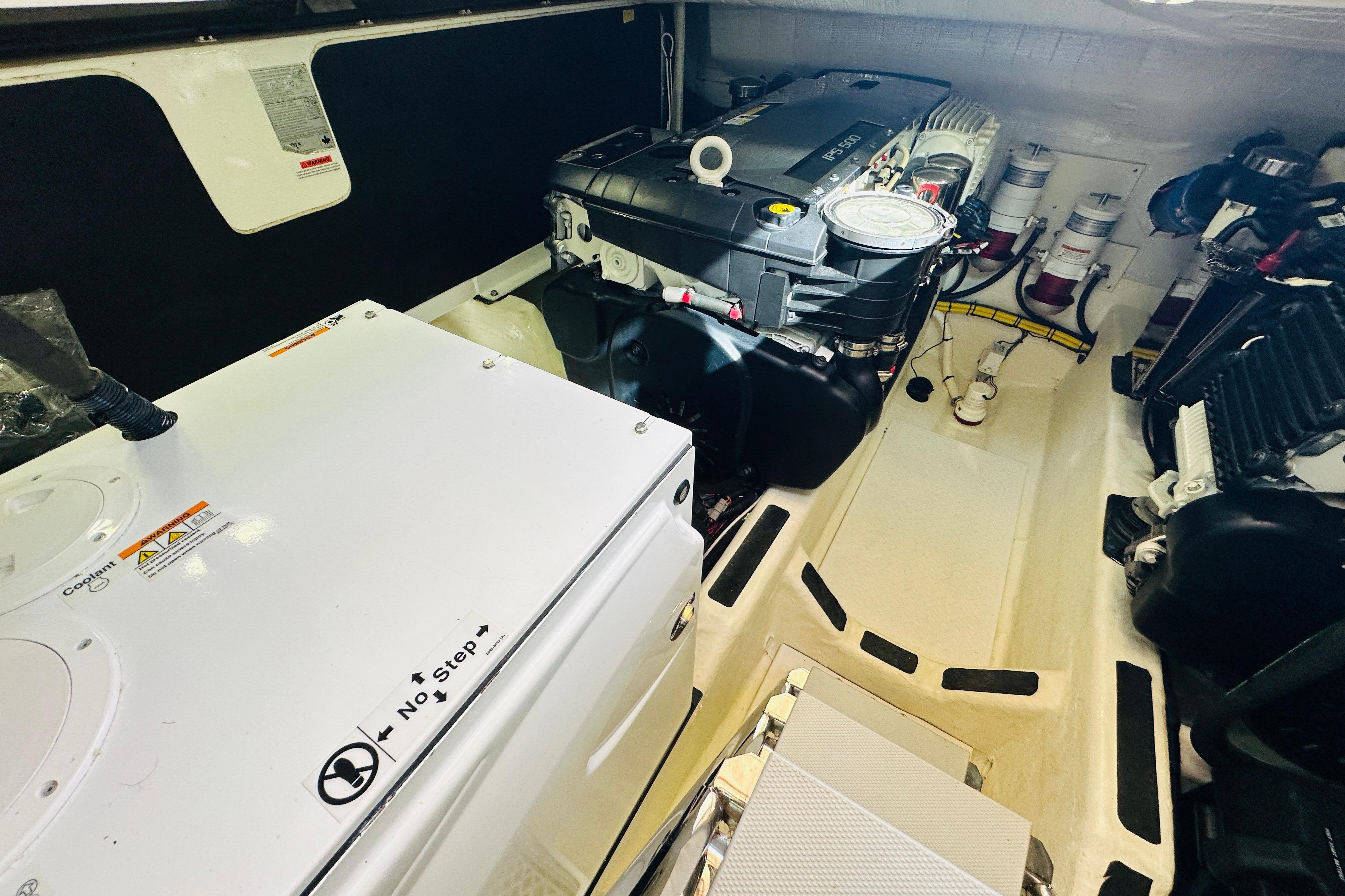 Engine room of 2017 Sabre 42 Salon Express, showcasing machinery and components.