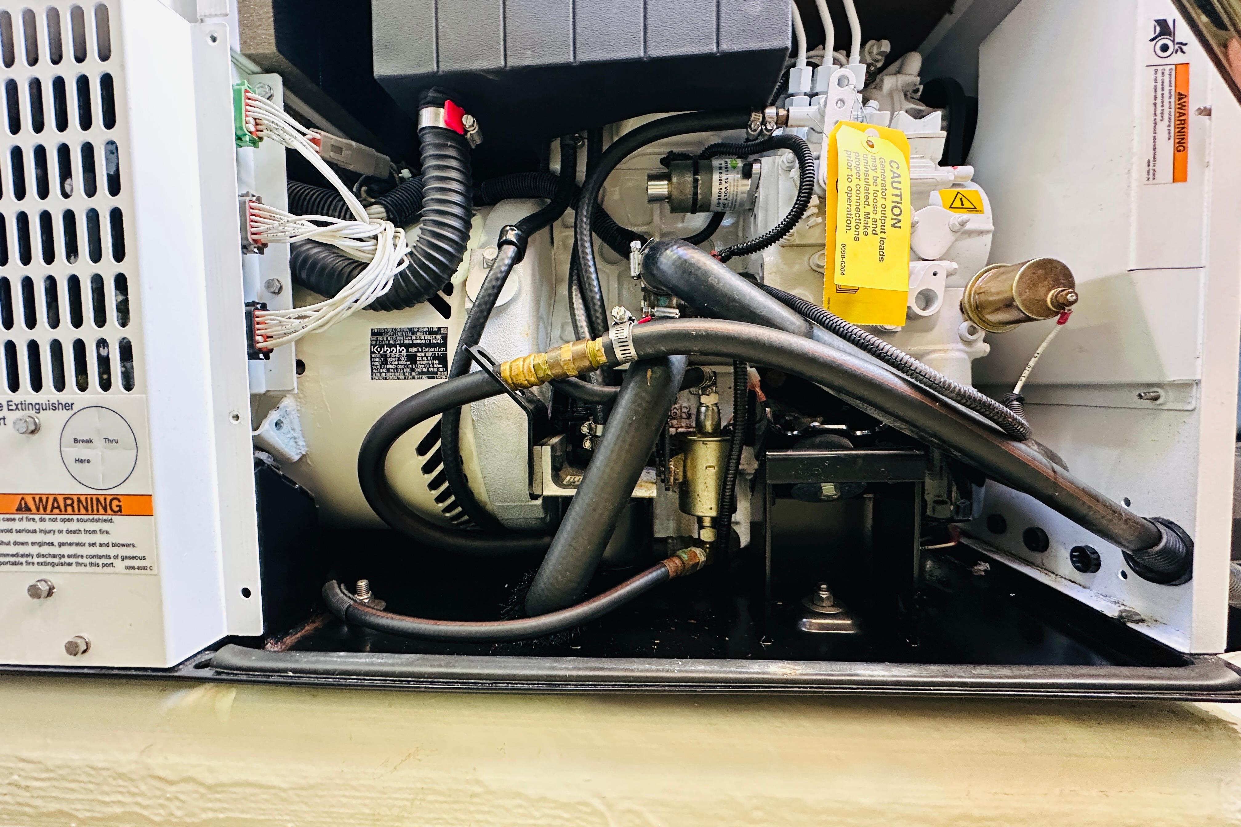 Engine compartment of a 2017 Sabre 42 Salon Express with visible wiring and components.