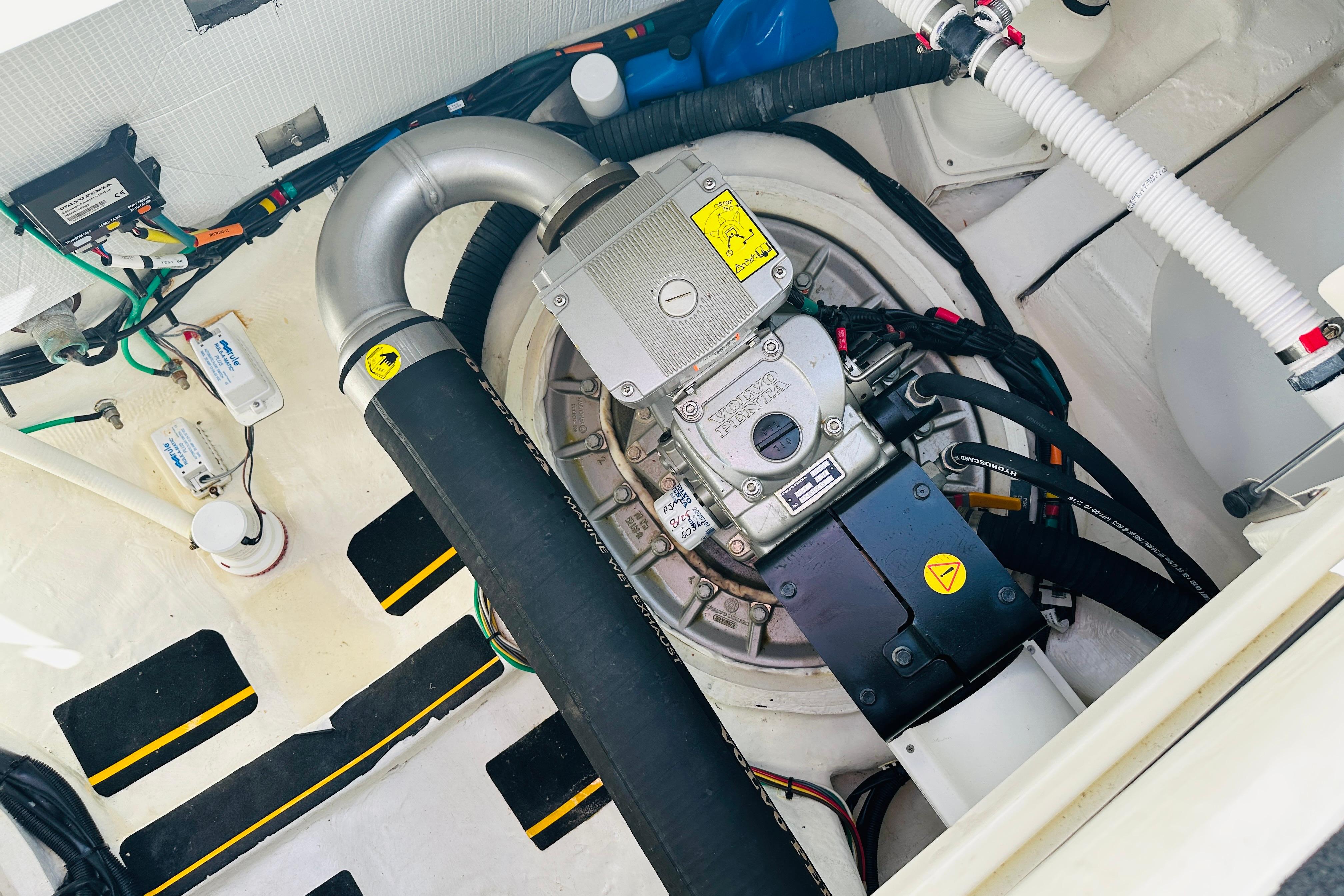 Engine compartment of 2017 Sabre 42 Salon Express, showcasing mechanical components and wiring.