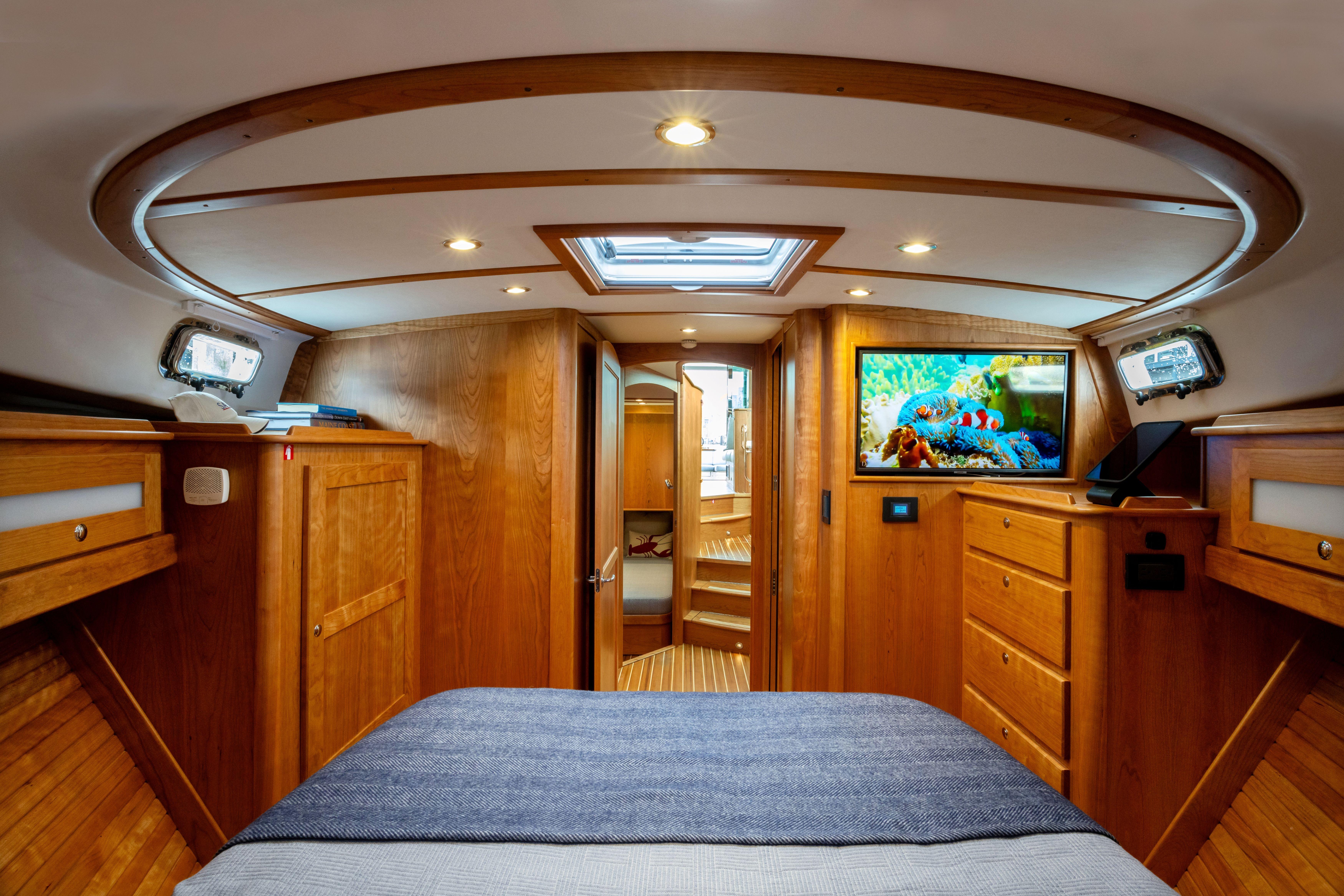Luxurious interior of 2026 Sabre 45 Salon Express yacht with wood finish and modern amenities.
