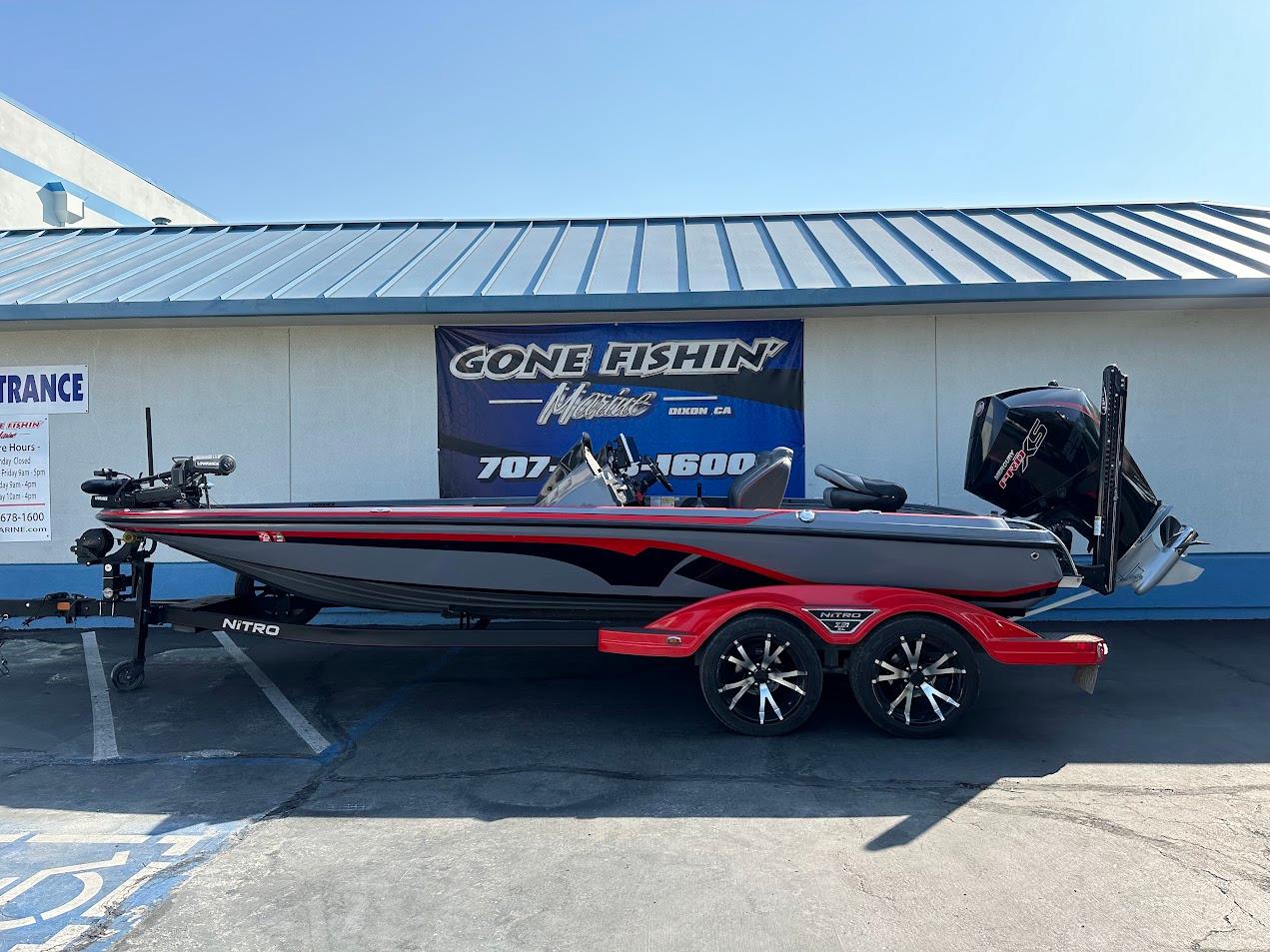 2023 Nitro Z21 XL Pro boat with sleek design, parked outside a dealership.