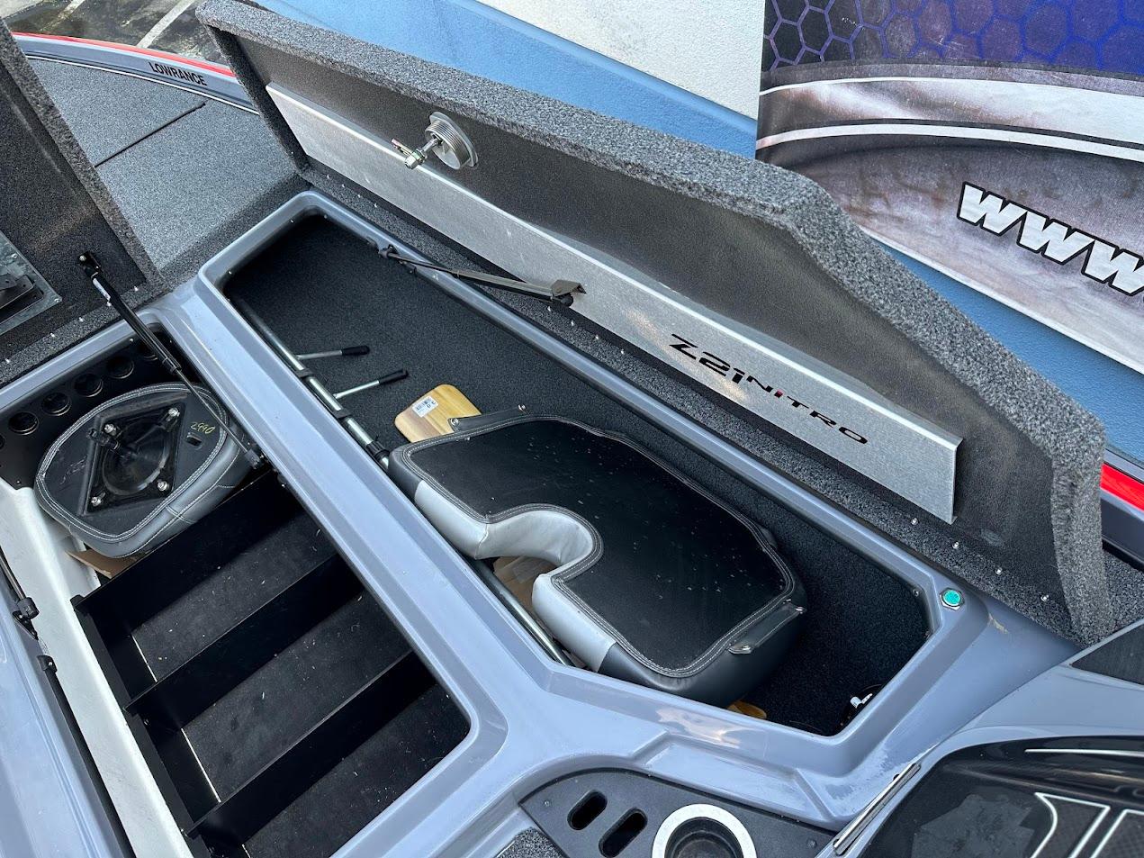 2023 Nitro Z21 XL Pro boat storage compartment with organized interior layout.