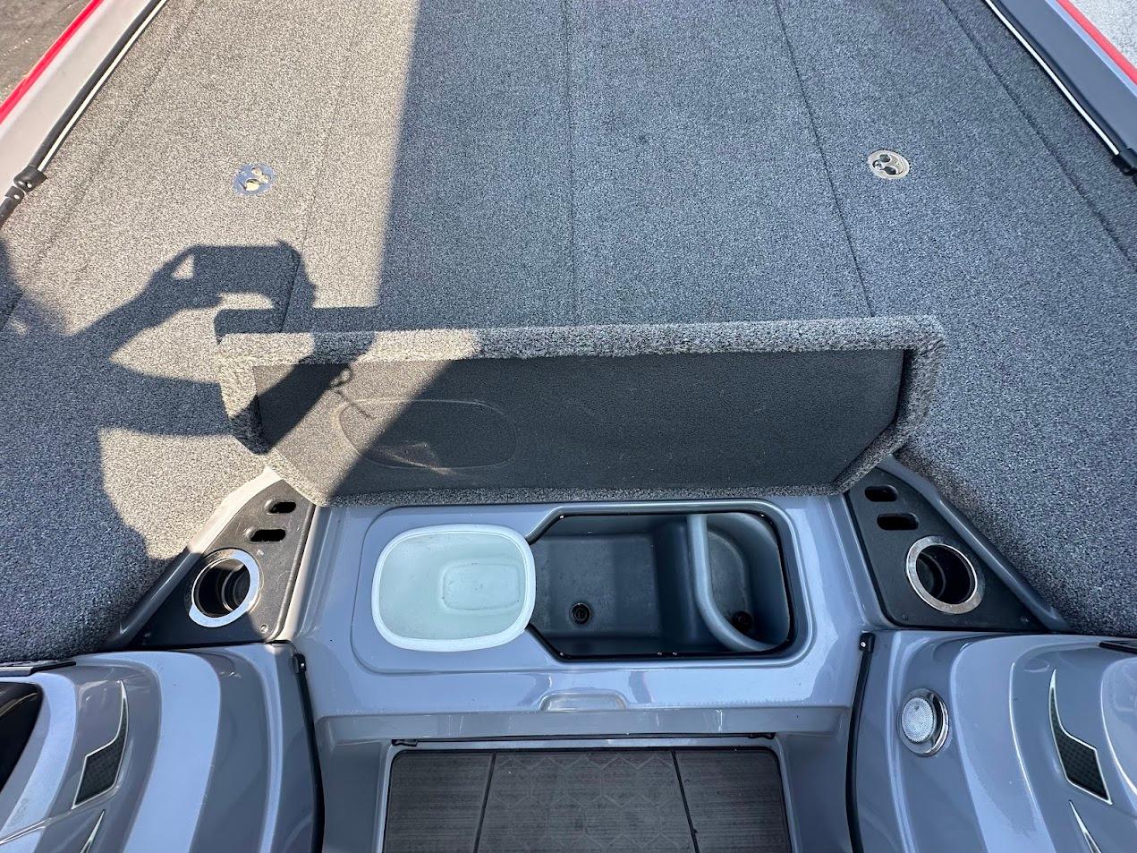 2023 Nitro Z21 XL Pro boat interior with storage compartments and cup holders.