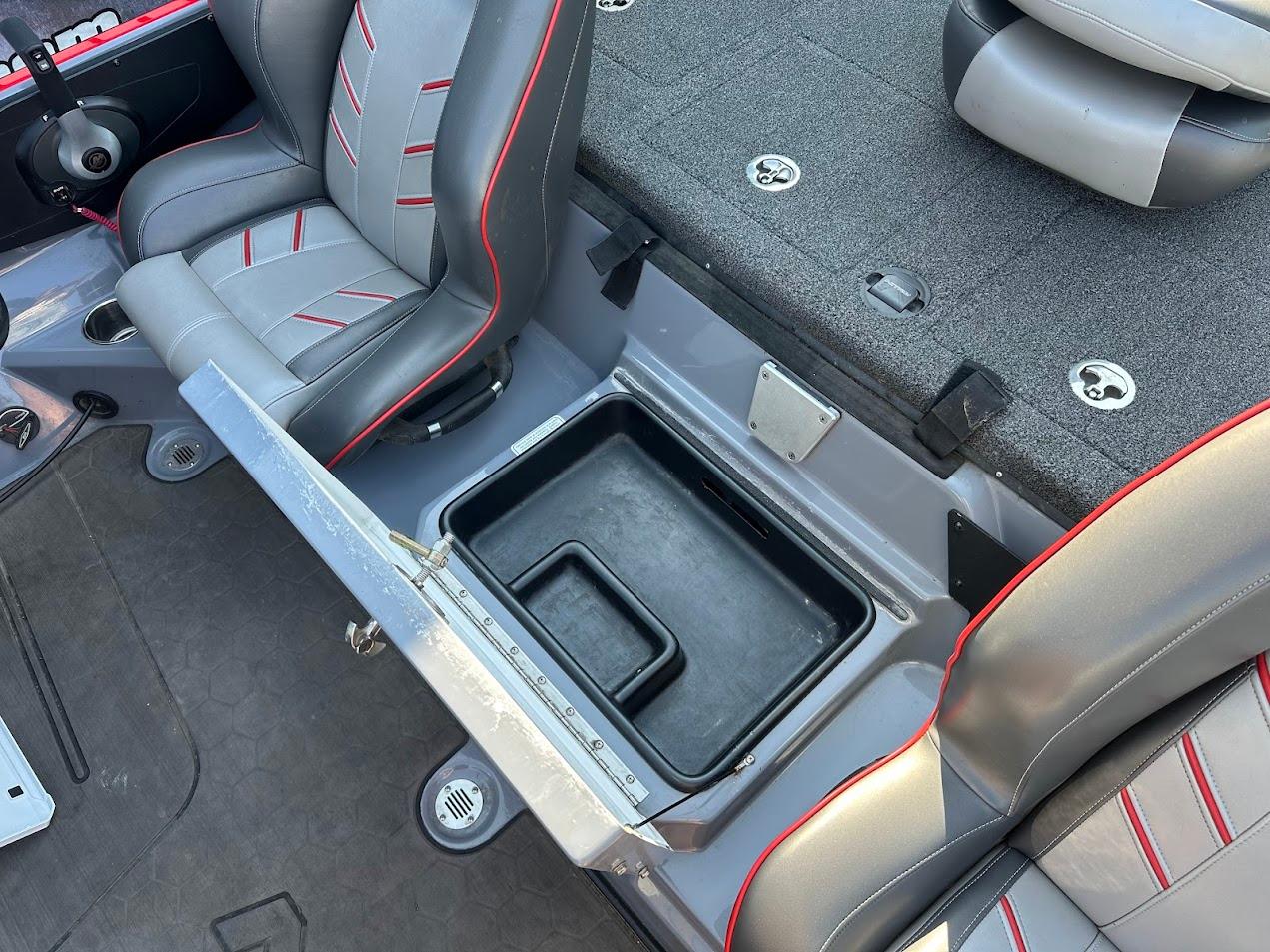 2023 Nitro Z21 XL Pro boat interior with storage compartment and seating.