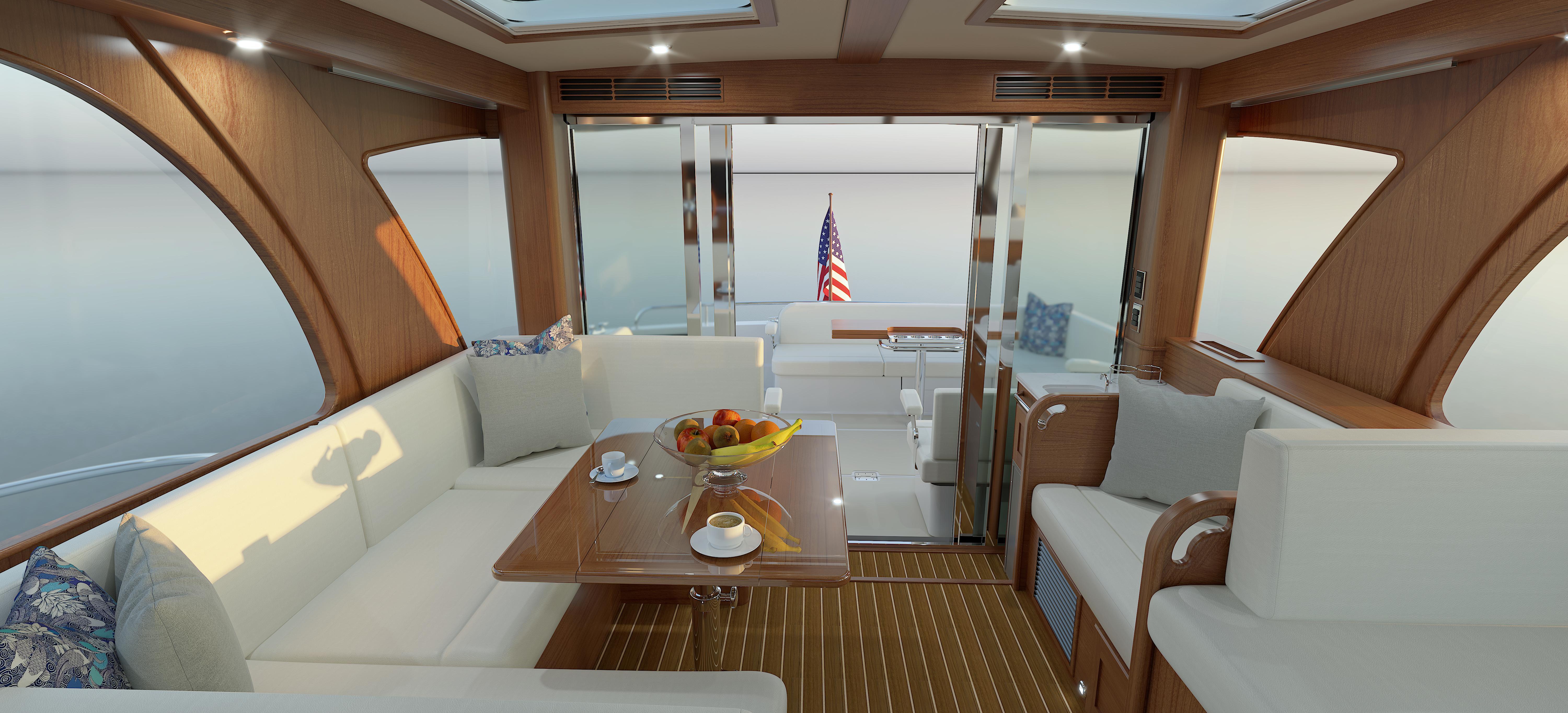Luxurious interior of 2026 Sabre 51 yacht with elegant seating and dining area.