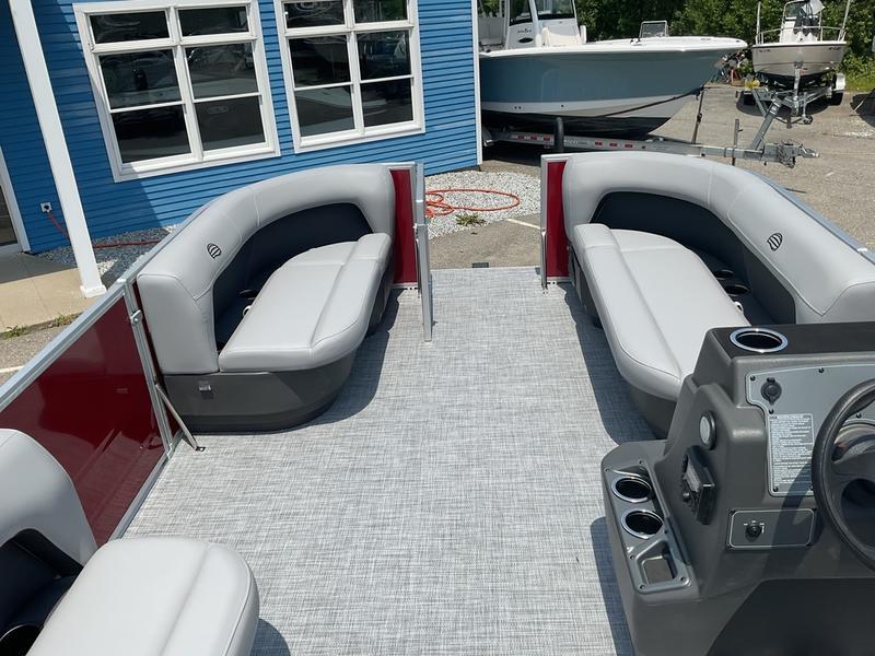 2026 Sun Tracker PB 16 DLX pontoon boat interior with gray seating and modern console.