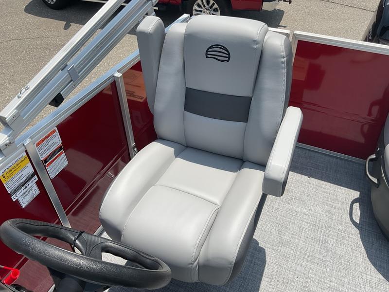 Captain's chair on 2026 Sun Tracker PB 16 DLX pontoon boat, featuring gray upholstery.