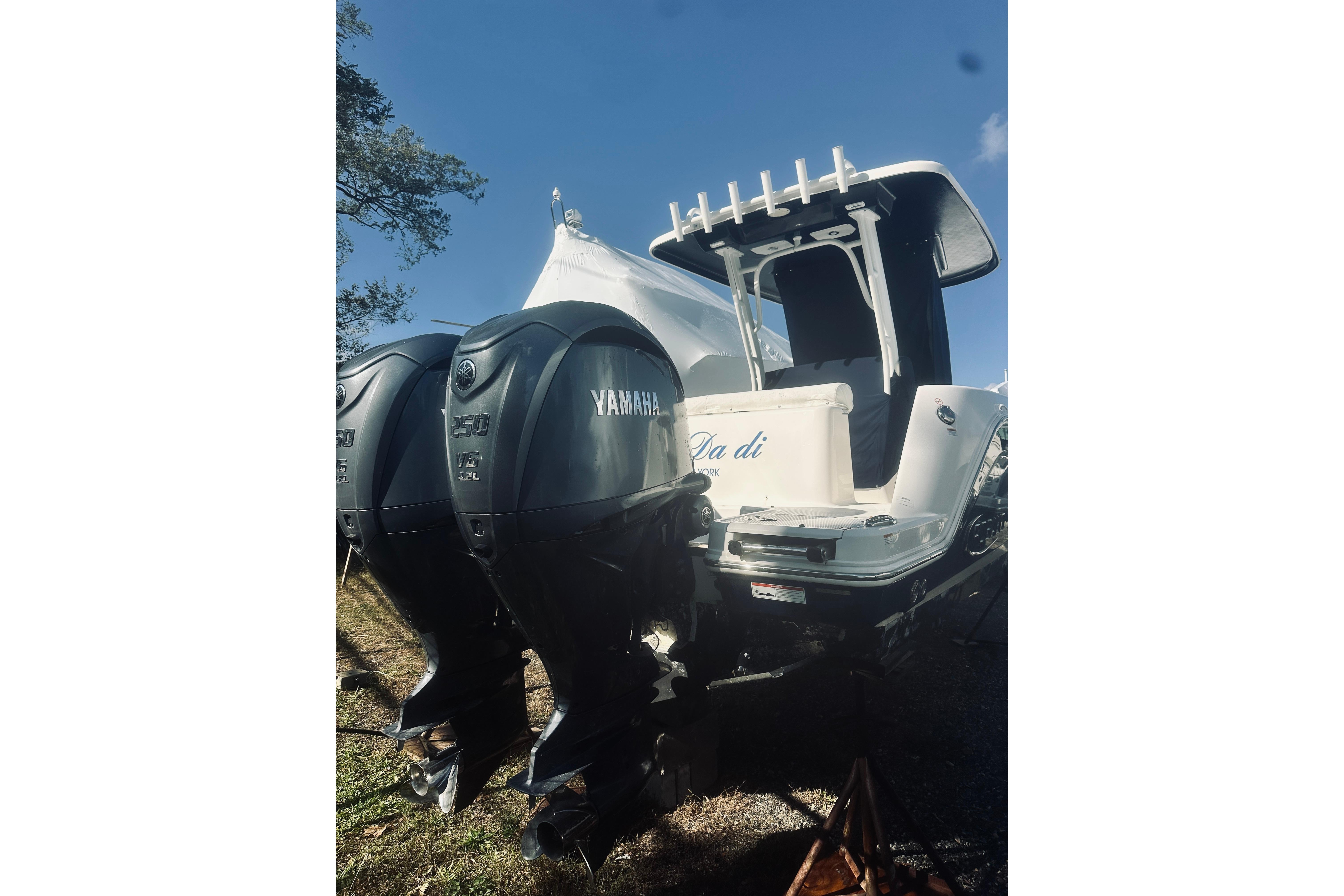 2022 Robalo R272 Center Console boat with dual Yamaha outboard engines.