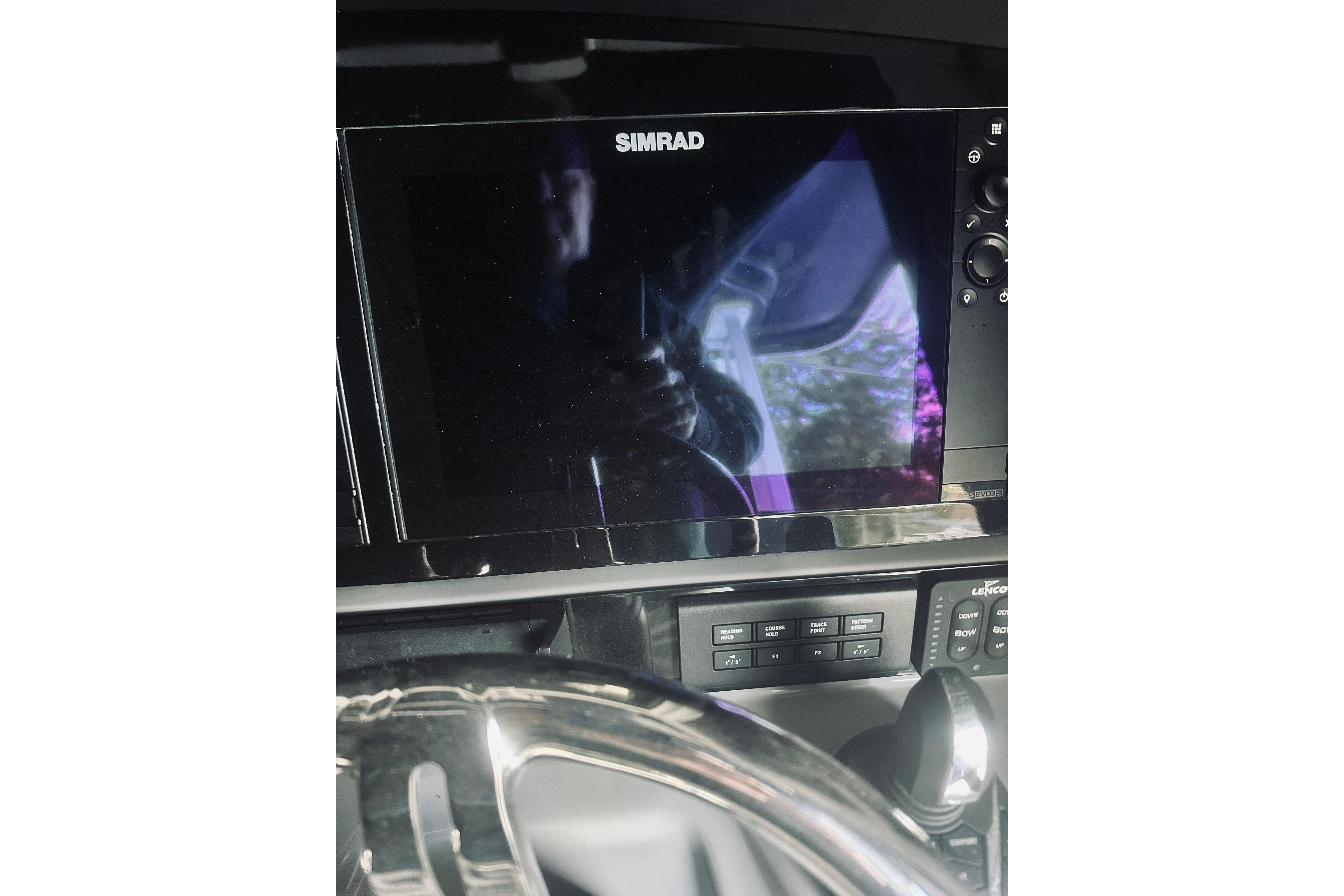 2022 Robalo R272 Center Console dashboard with Simrad display and controls.