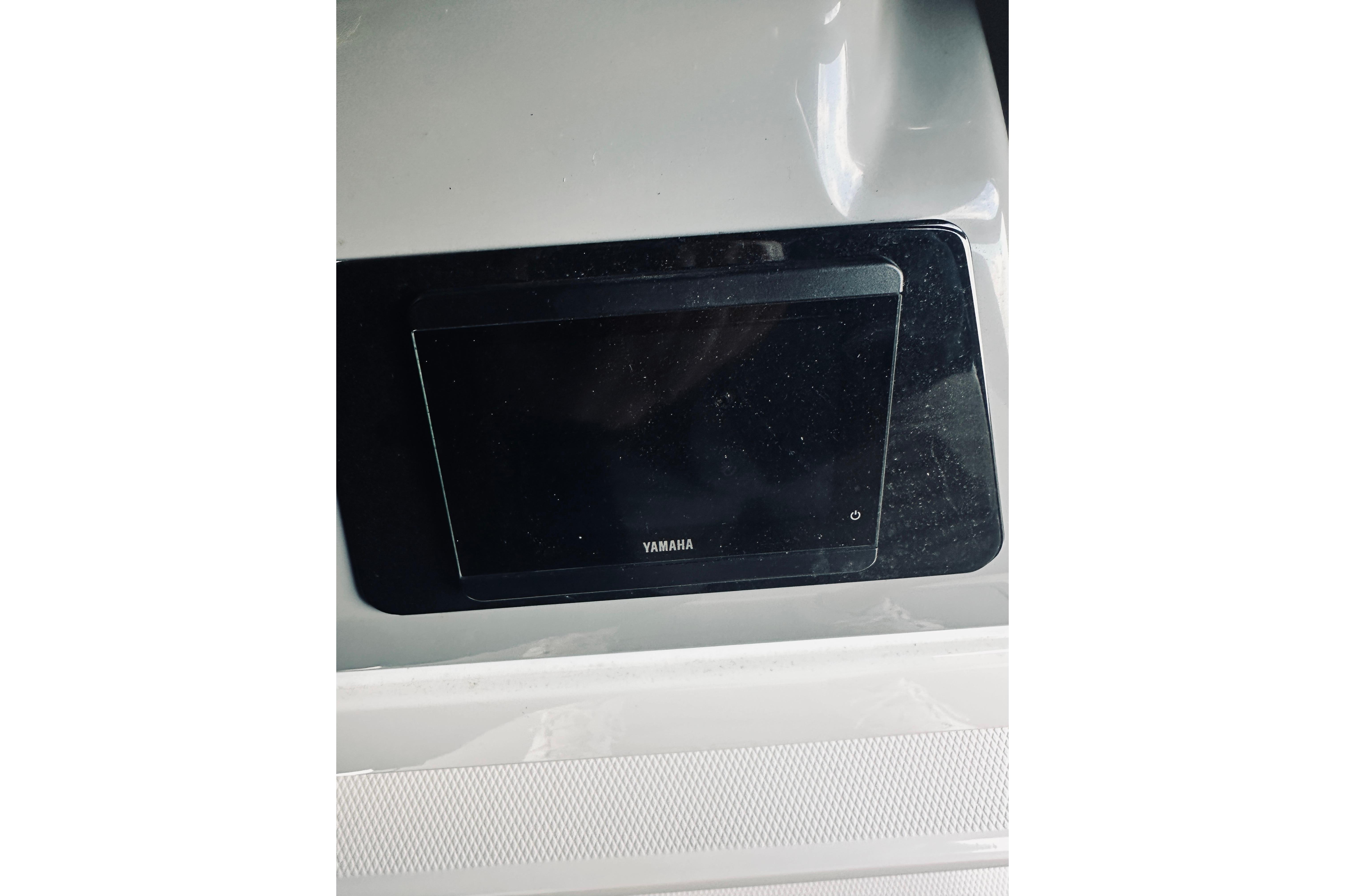 Yamaha display screen on 2022 Robalo R272 Center Console boat dashboard.