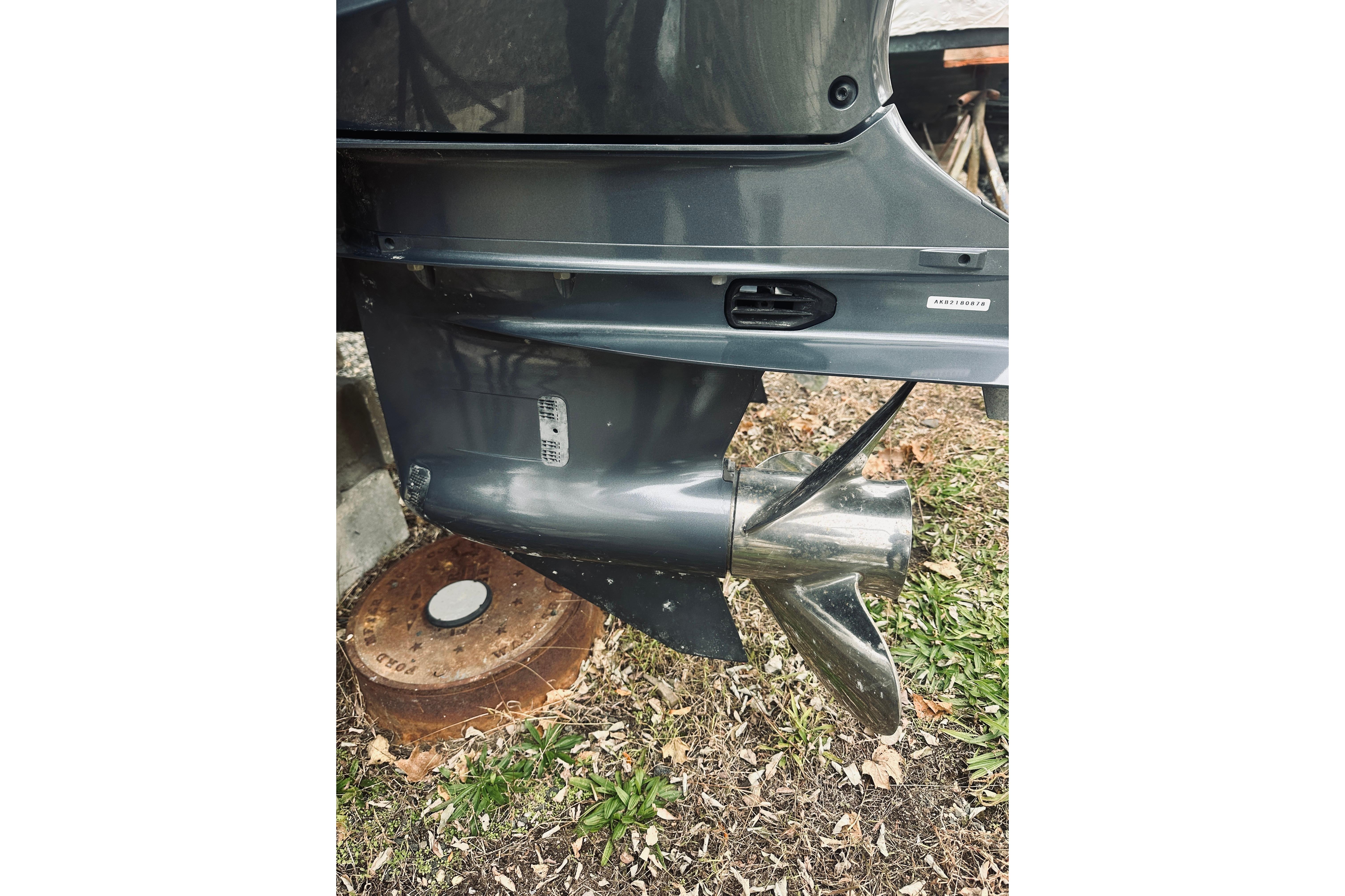 2022 Robalo R272 Center Console boat propeller and lower unit detail.