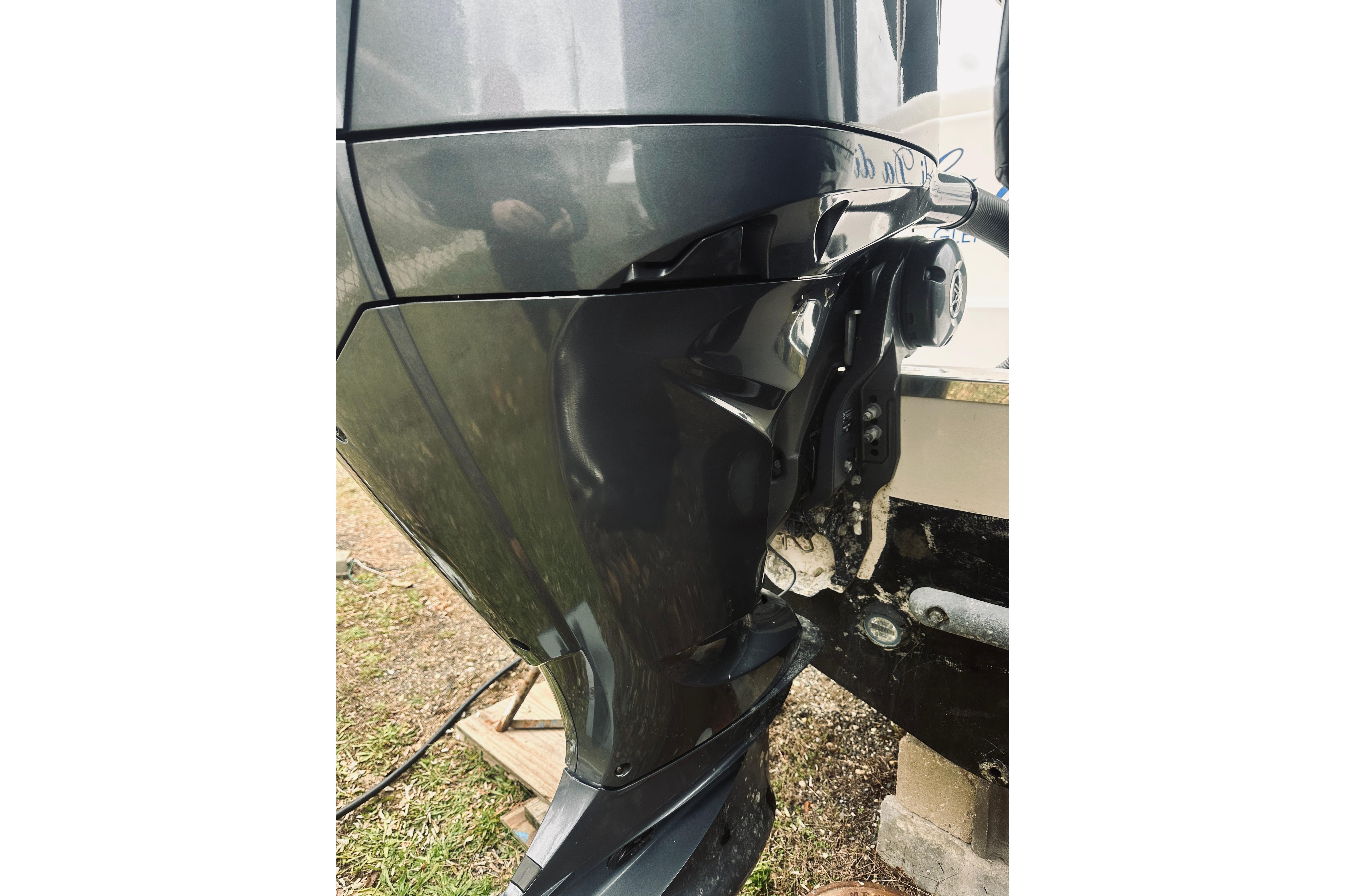 2022 Robalo R272 Center Console boat engine close-up, showcasing sleek design and mechanics.