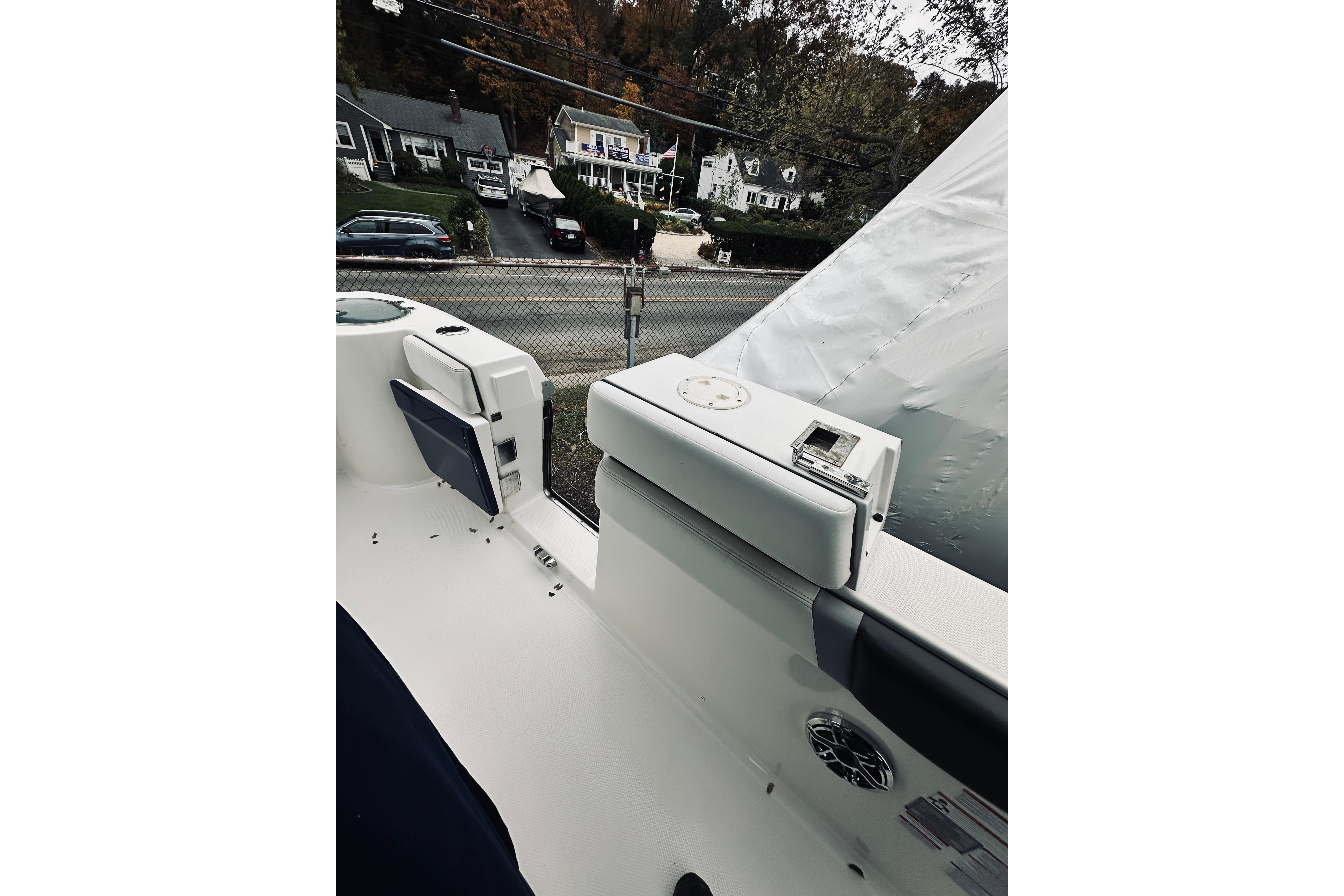 2022 Robalo R272 Center Console boat interior with seating and speaker detail.