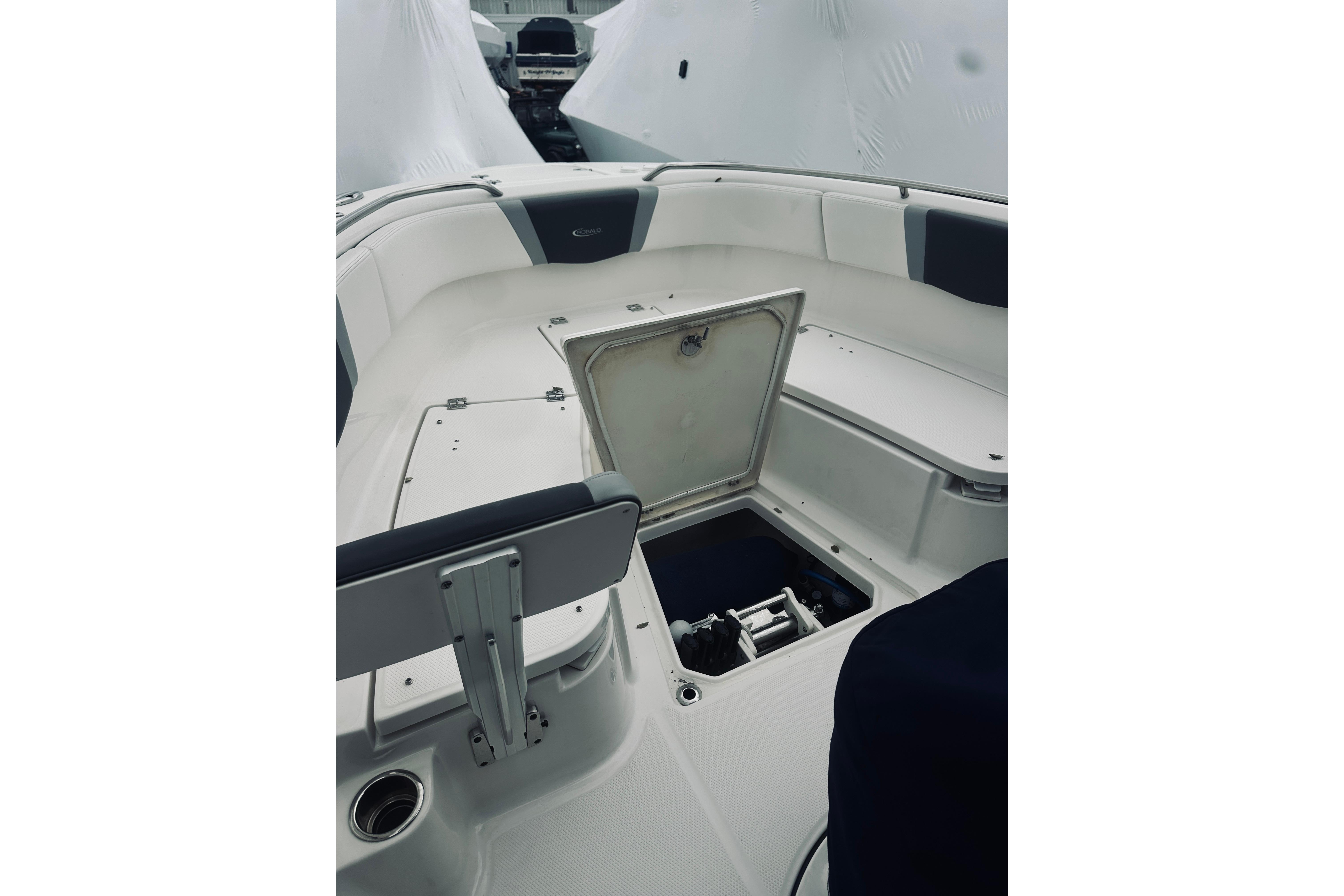 2022 Robalo R272 Center Console boat interior with open storage compartment.