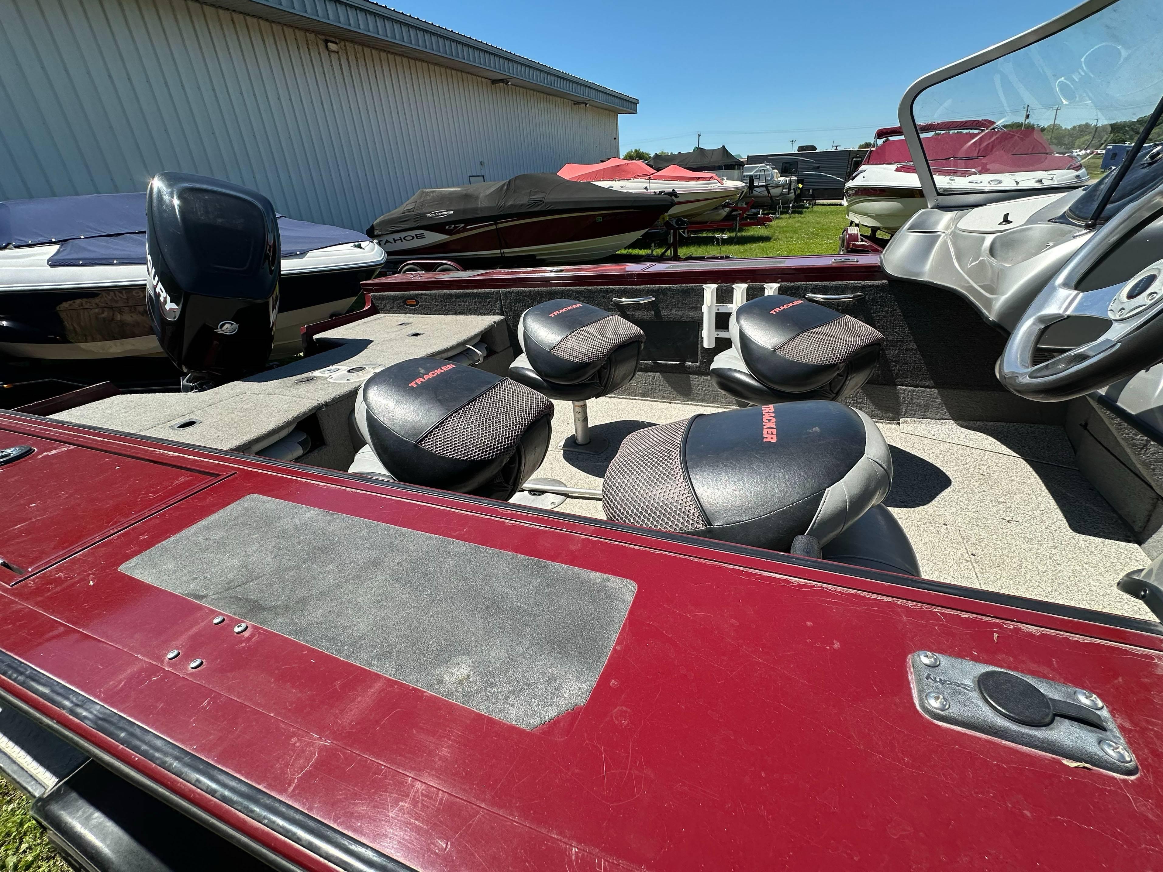2011 Tracker Targa V-18 Combo boat interior with seating and steering wheel.