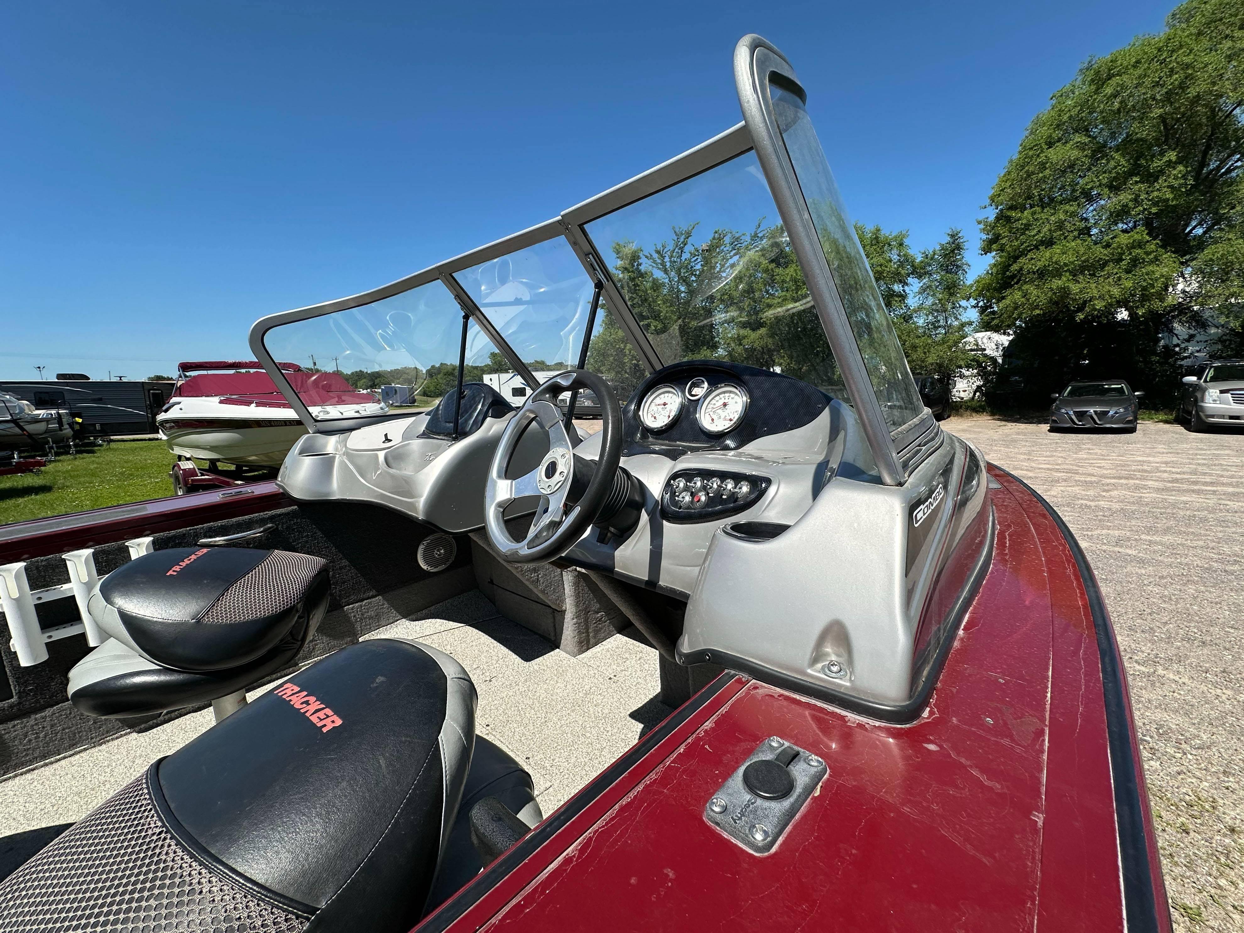 2011 Tracker Targa V-18 Combo boat interior with steering wheel and dashboard gauges.