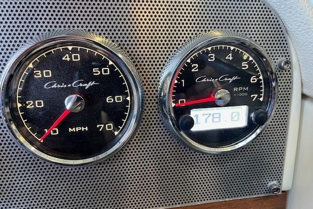 Close-up of 2021 Chris-Craft Launch 27 speedometer and tachometer gauges.