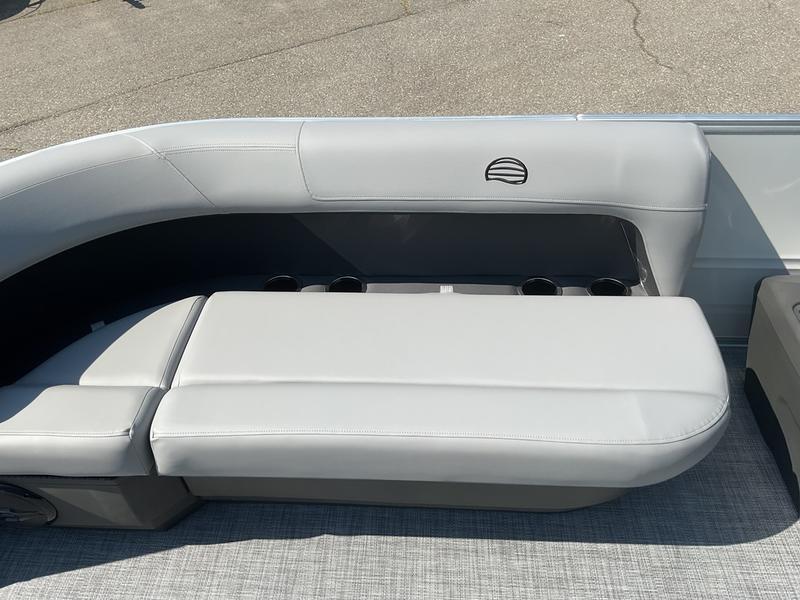 2026 Sun Tracker PB 16 DLX boat seating with cup holders, featuring sleek gray upholstery.