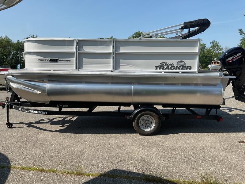 2026 Sun Tracker PB 16 DLX pontoon boat on trailer, side view.