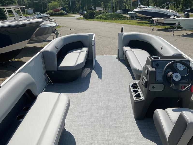 2026 Sun Tracker PB 16 DLX pontoon boat with spacious seating and modern dashboard.
