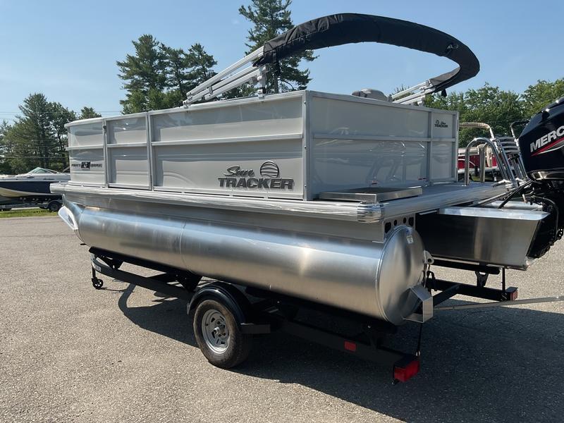 2026 Sun Tracker PB 16 DLX pontoon boat on trailer, outdoor setting.