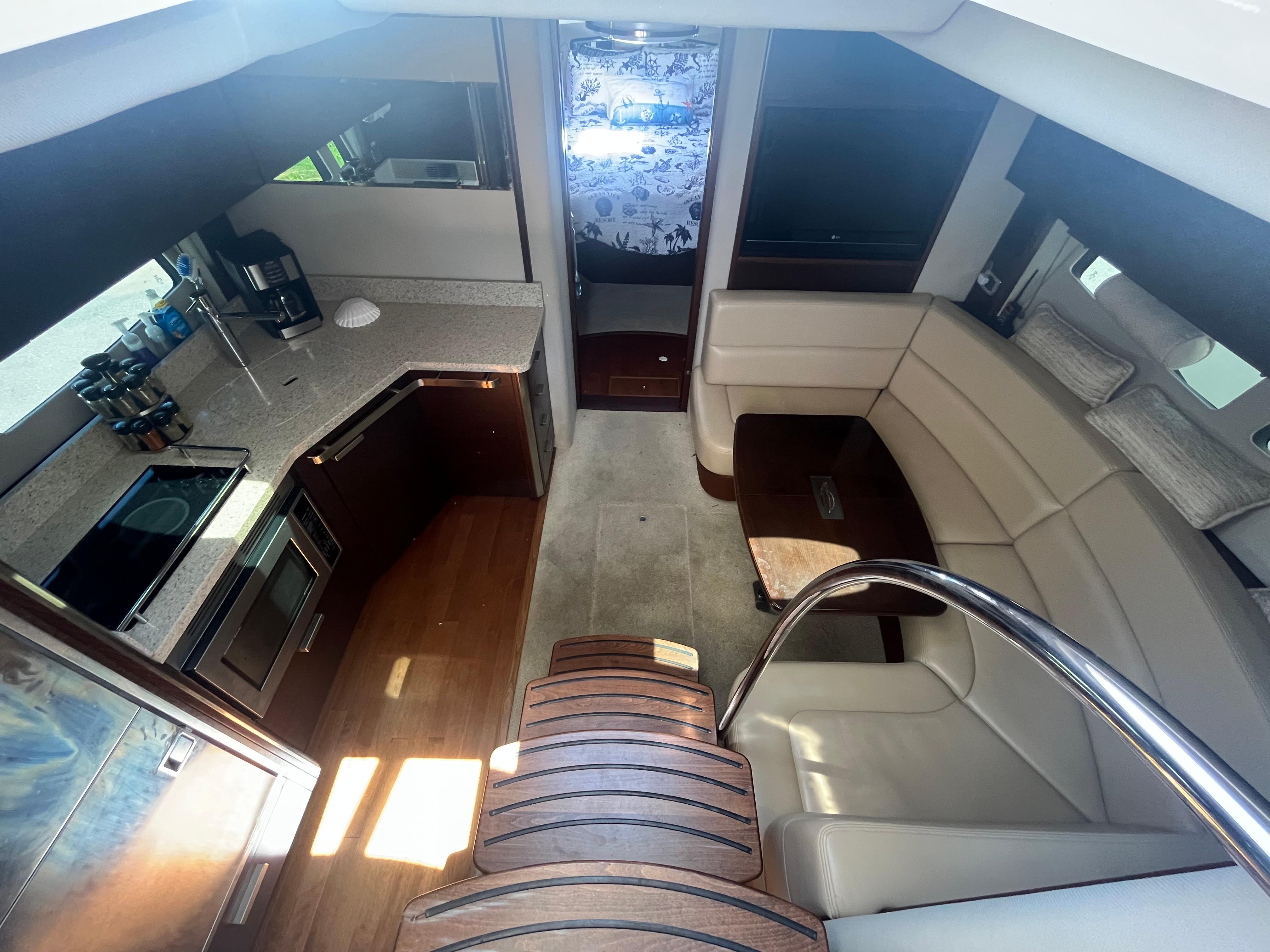 Chaparral-400 Premiere 2010-AURORA MA-US-Interior of 2010 Chaparral 400 Premiere yacht with modern kitchen and cozy seating area.-9799863 | Thumbnail