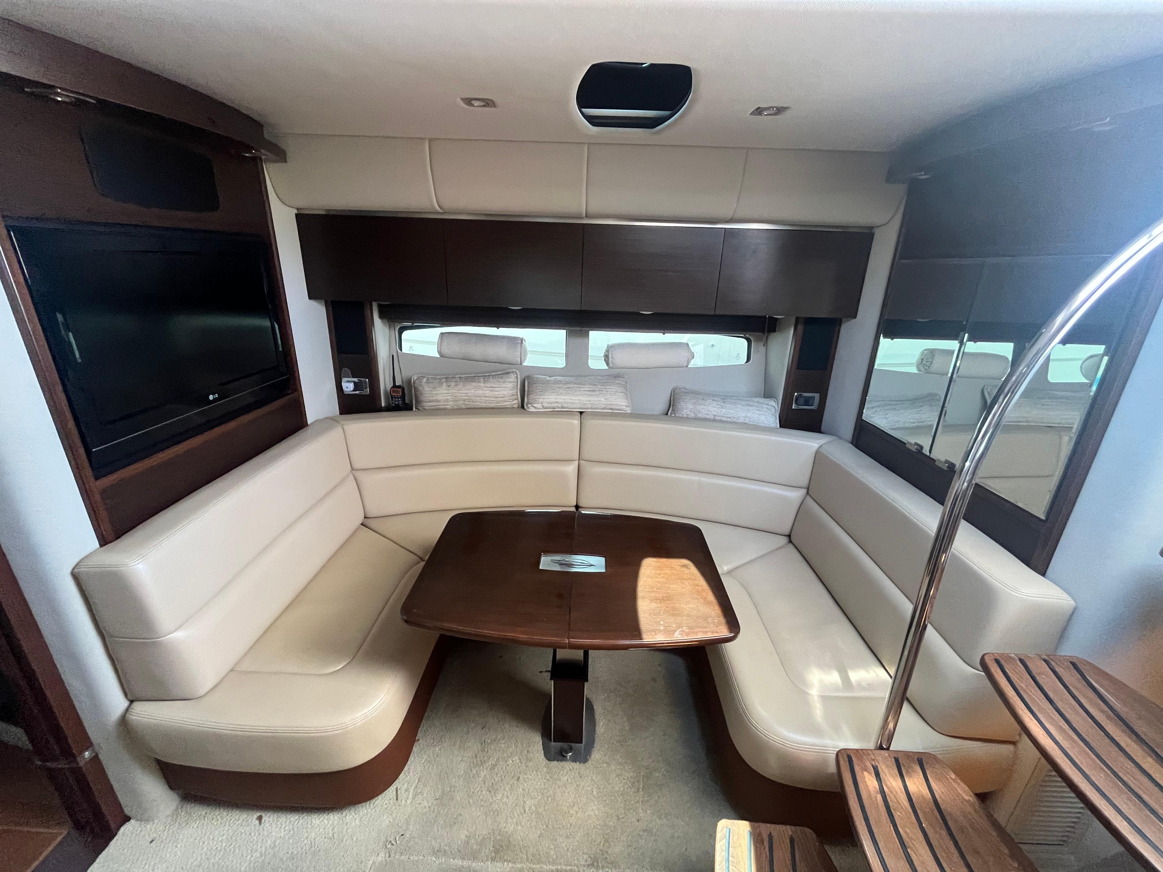 Chaparral-400 Premiere 2010-AURORA MA-US-Luxurious interior of 2010 Chaparral 400 Premiere yacht with plush seating and elegant table.-9799863 | Thumbnail