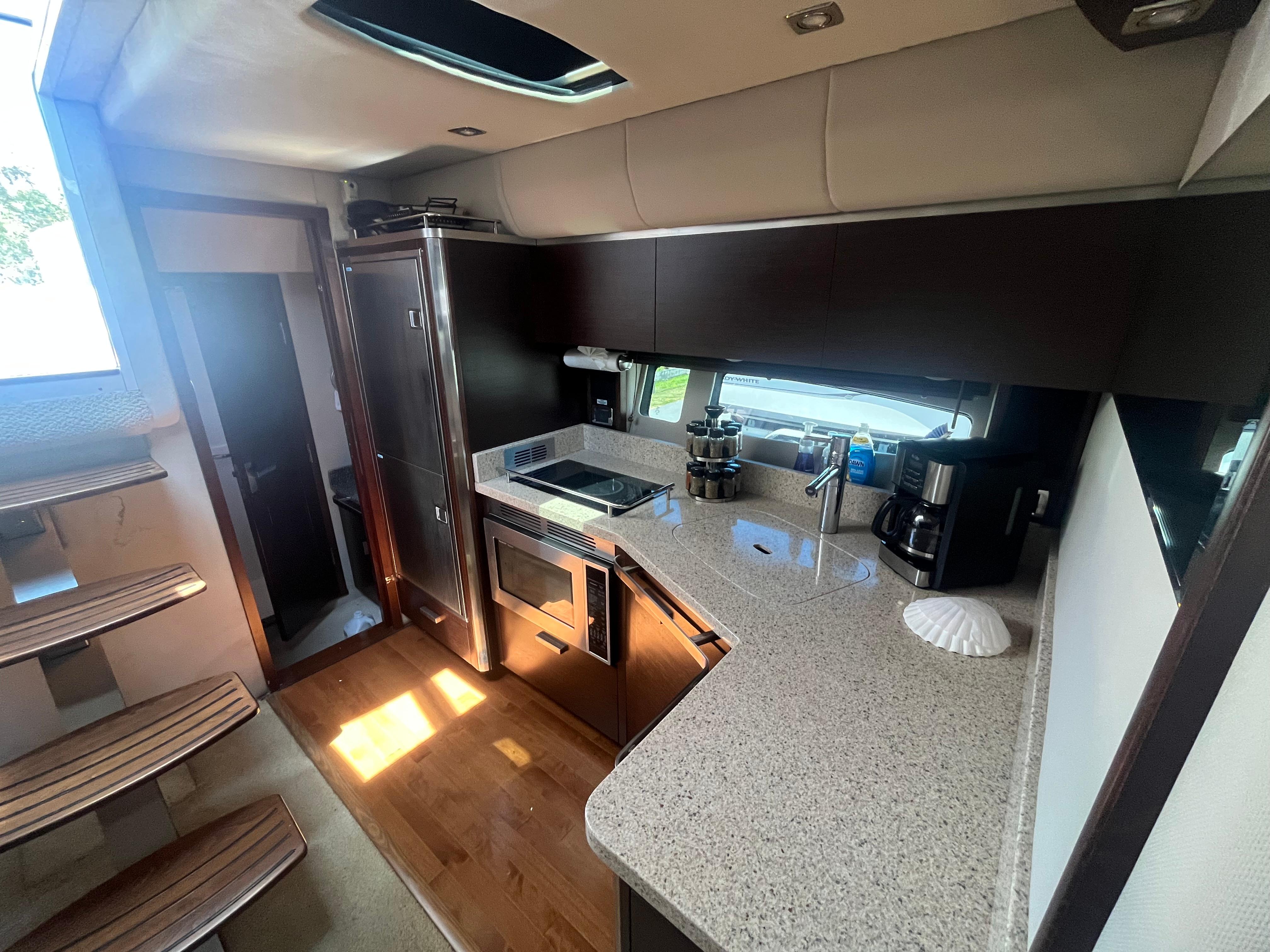 Chaparral-400 Premiere 2010-AURORA MA-US-Luxurious kitchen interior of 2010 Chaparral 400 Premiere yacht with modern appliances.-9799863 | Thumbnail