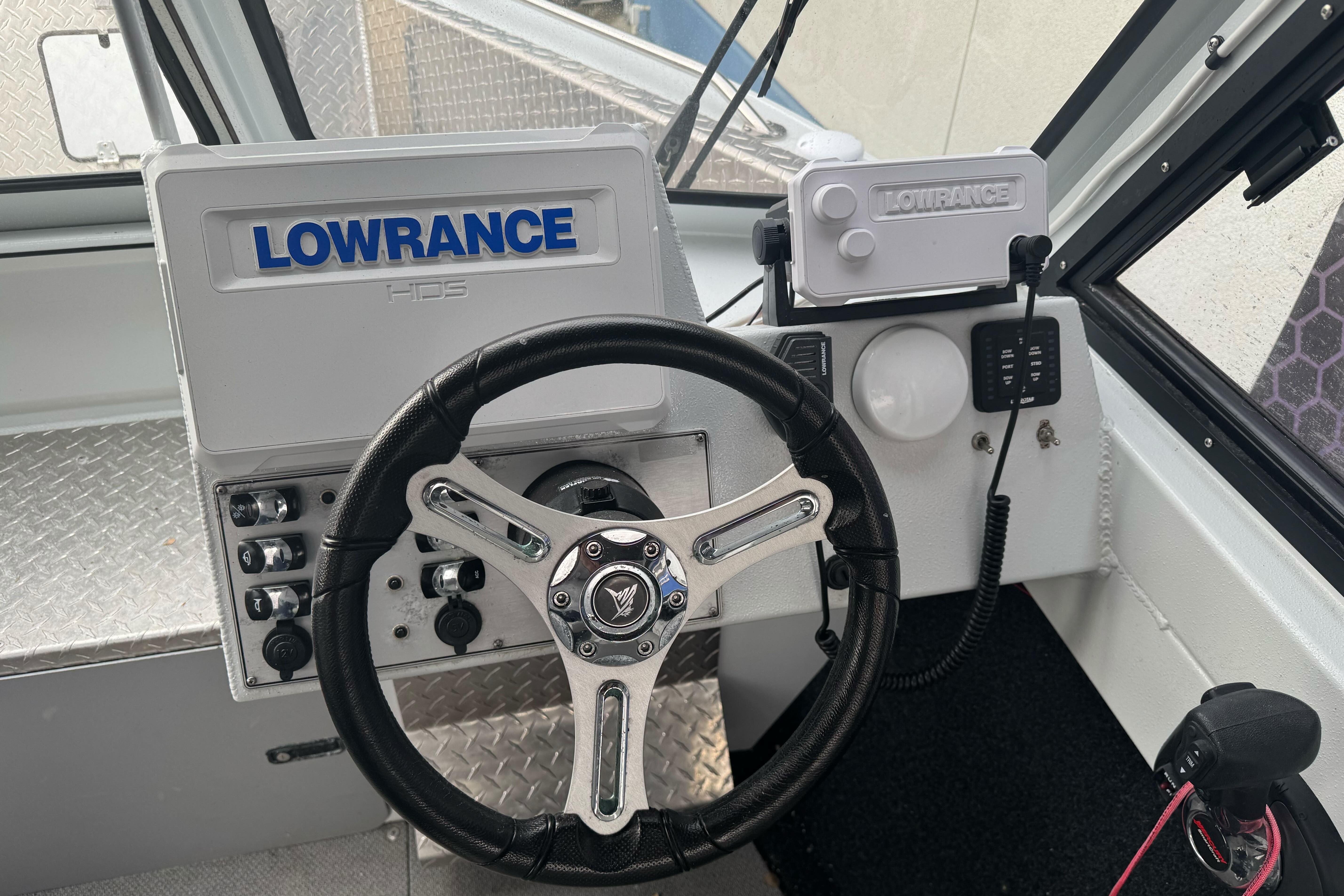 Steering console of 2021 KingFisher 2025 Escape HHT with Lowrance electronics.