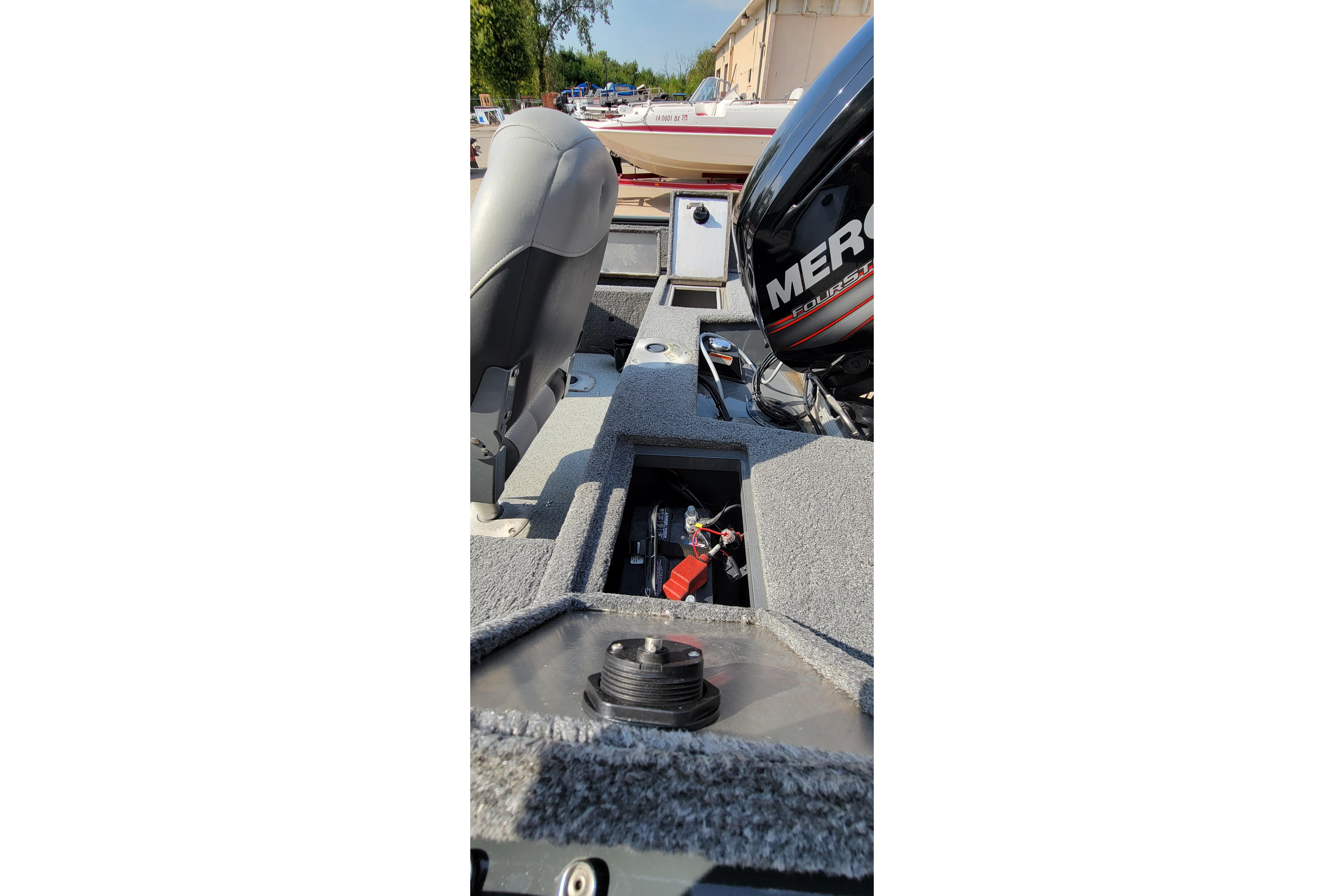 2016 TRACKER MARINE PRO GUIDE V-16 SC boat interior with Mercury engine.