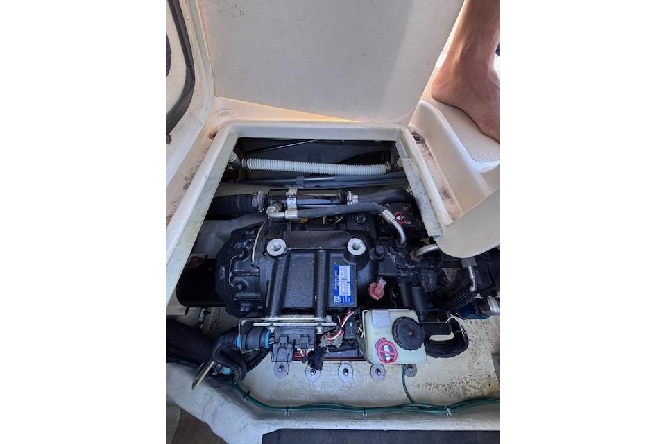 Engine compartment of a 2012 Sabre 42 Salon Express boat, showing mechanical components.