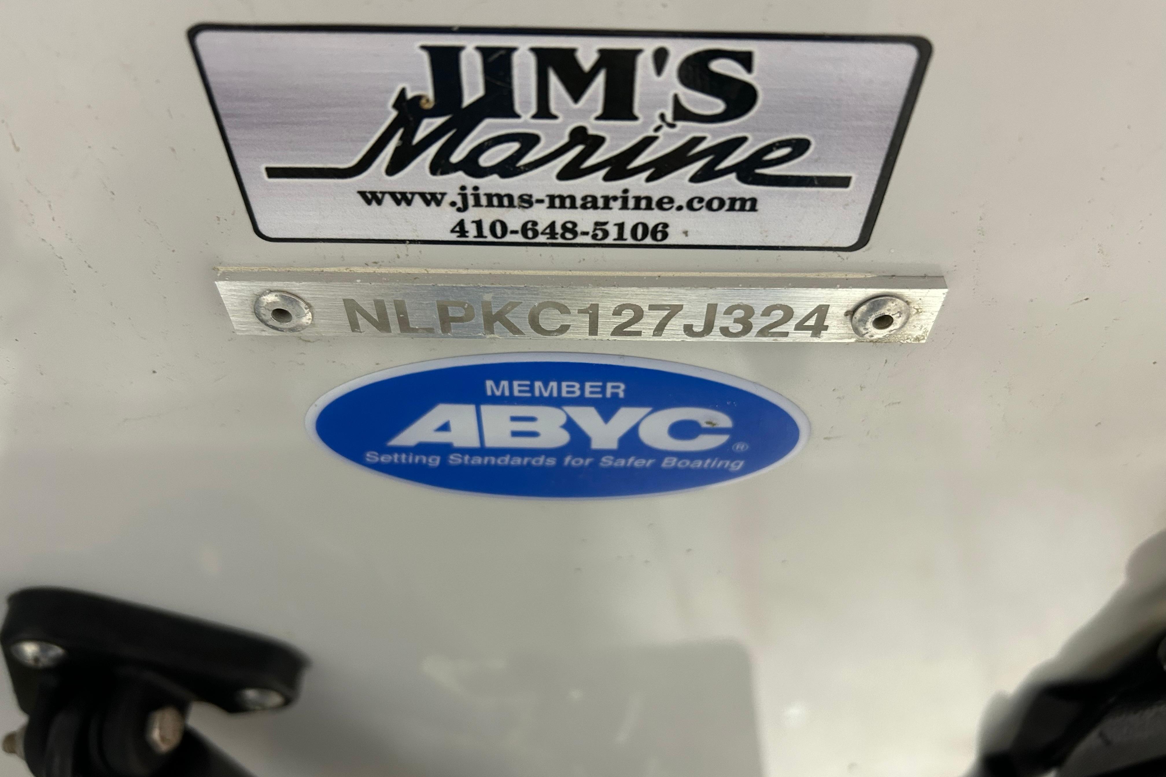 2024 Tidewater 198 CC Adventure boat with Jimu0027s Marine and ABYC member stickers.