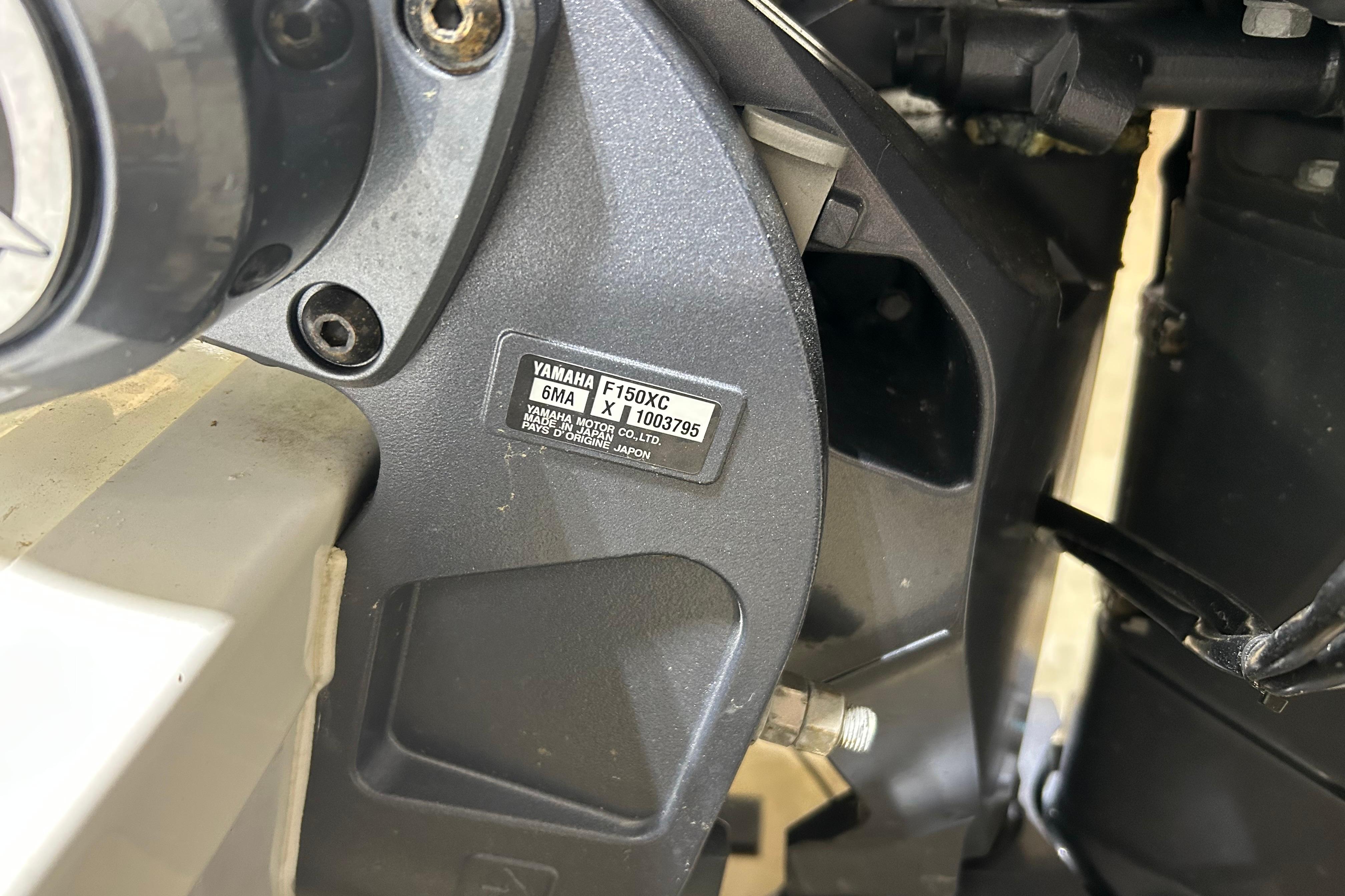 Close-up of Yamaha F150XC engine on 2024 Tidewater 198 CC Adventure boat.