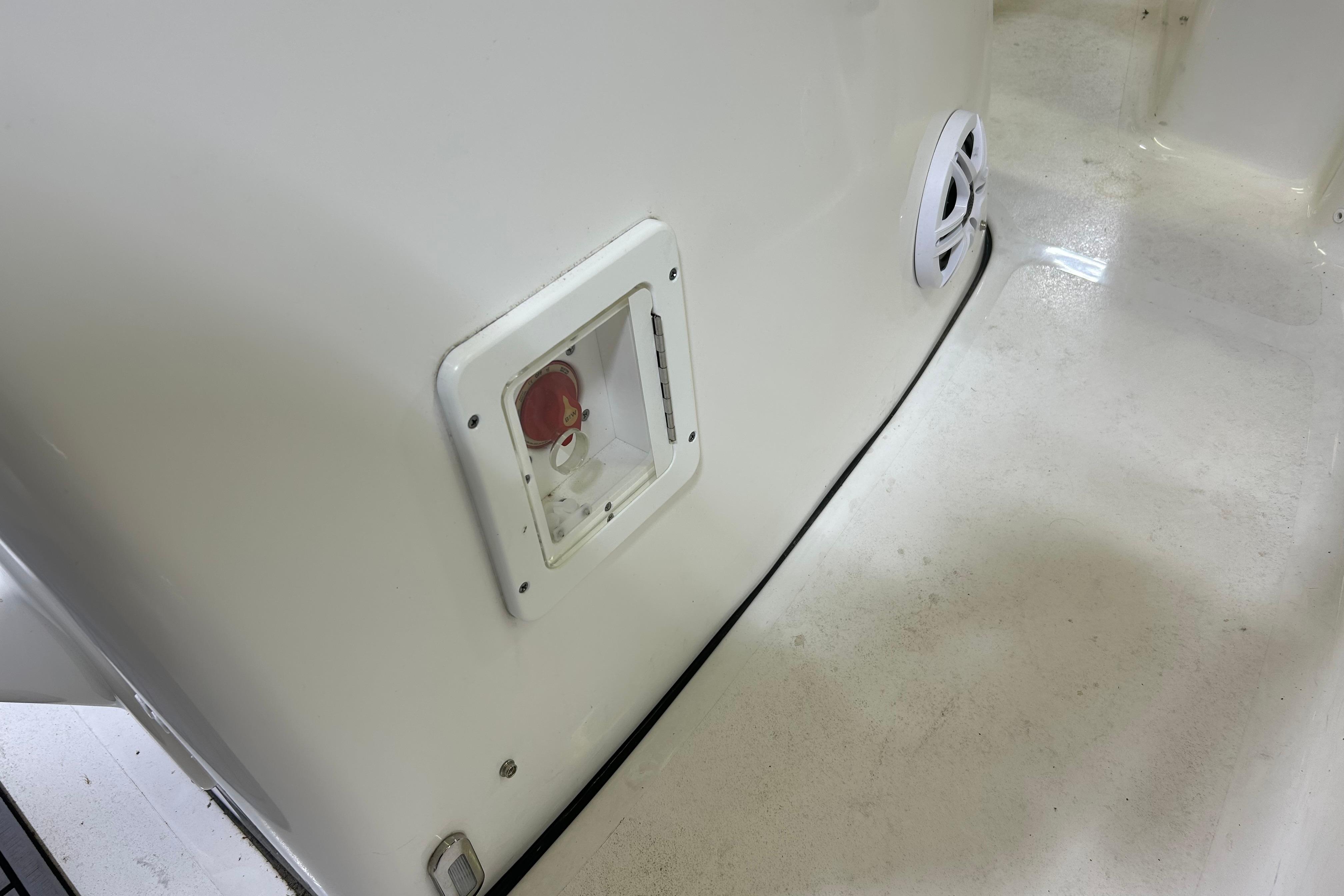 2024 Tidewater 198 CC Adventure boat interior detail with control panel and speaker.