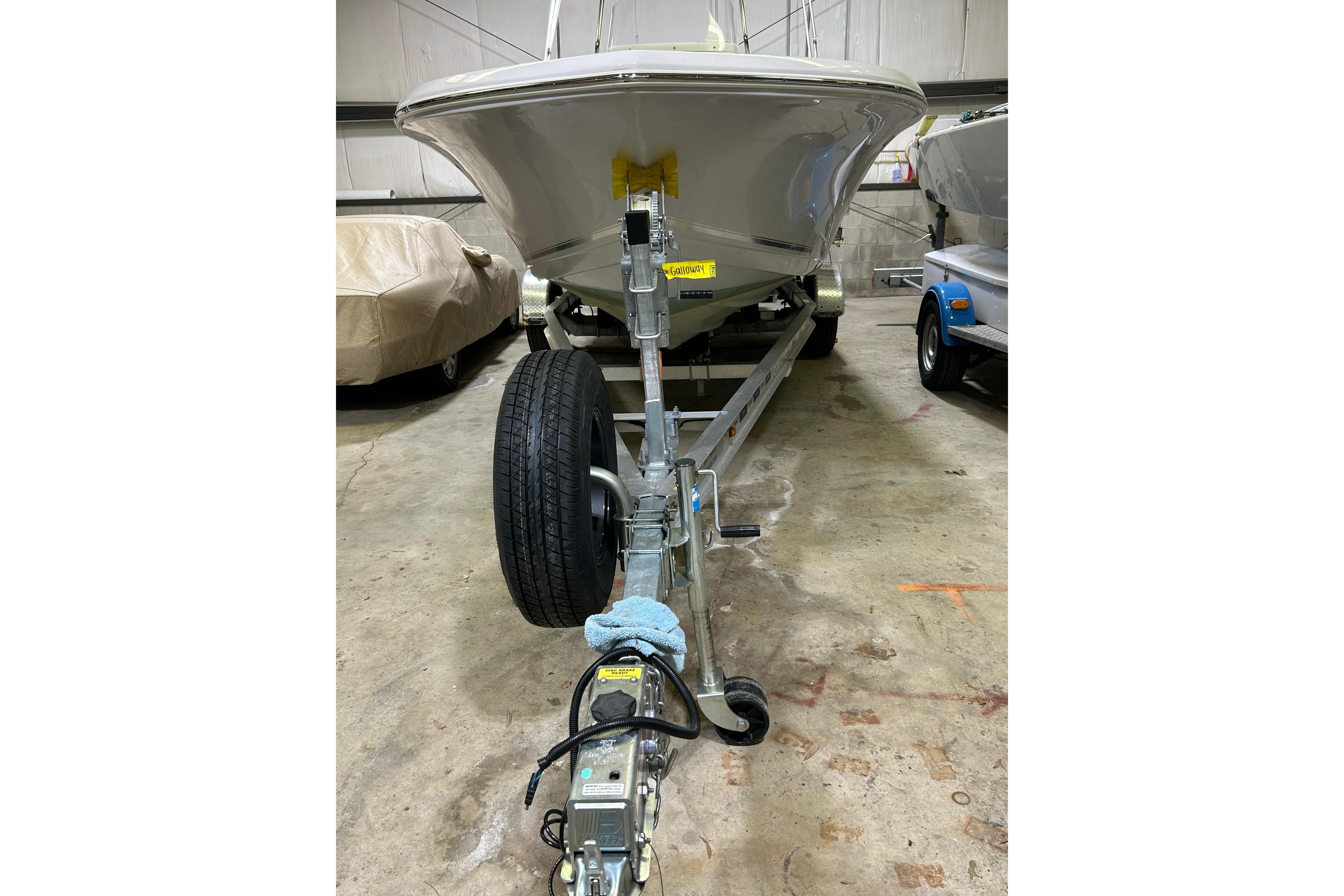 2024 Tidewater 198 CC Adventure boat on trailer in storage facility.